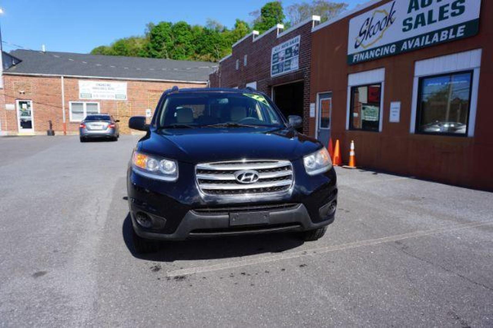 2012 Twilight Black Hyundai Santa Fe SPORT UTILITY 4-DR (5XYZGDAB1CG) with an 2.4L L4 DOHC 16V engine, 6-Speed Automatic transmission, located at 312 Centre Ave, Schuylkill Haven, PA, 17972, (570) 593-5278, 40.638130, -76.177383 - Photo#1