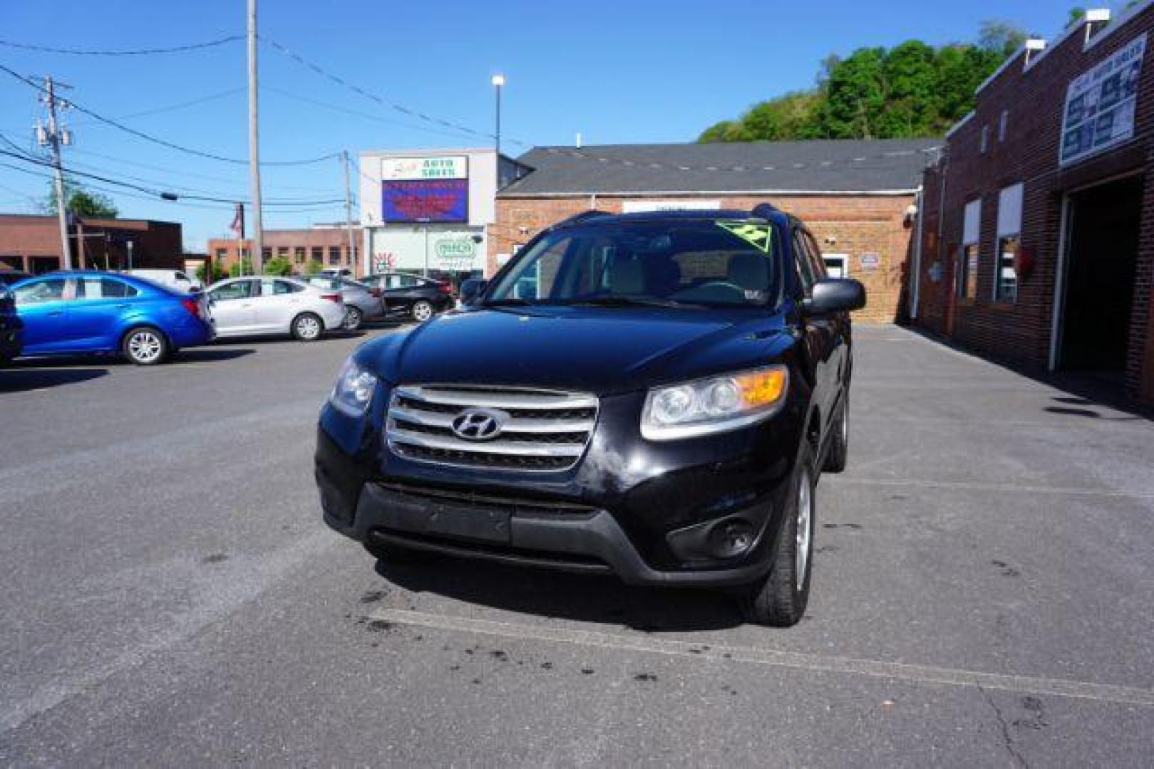 2012 Twilight Black Hyundai Santa Fe SPORT UTILITY 4-DR (5XYZGDAB1CG) with an 2.4L L4 DOHC 16V engine, 6-Speed Automatic transmission, located at 312 Centre Ave, Schuylkill Haven, PA, 17972, (570) 593-5278, 40.638130, -76.177383 - Photo#3