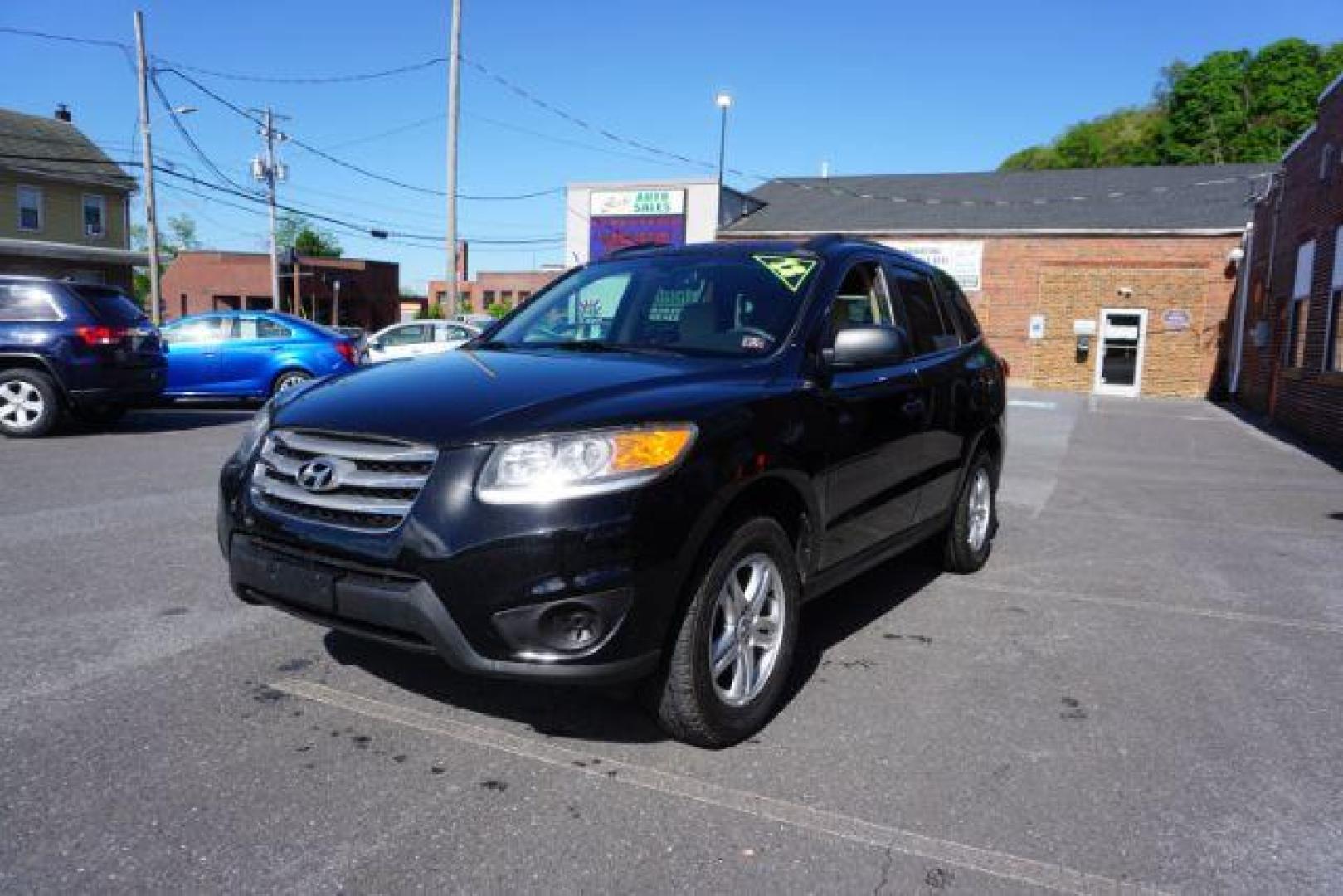 2012 Twilight Black Hyundai Santa Fe SPORT UTILITY 4-DR (5XYZGDAB1CG) with an 2.4L L4 DOHC 16V engine, 6-Speed Automatic transmission, located at 312 Centre Ave, Schuylkill Haven, PA, 17972, (570) 593-5278, 40.638130, -76.177383 - Photo#4