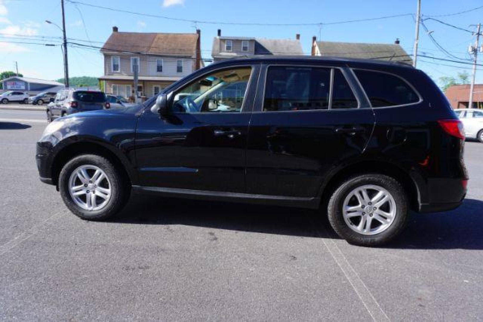 2012 Twilight Black Hyundai Santa Fe SPORT UTILITY 4-DR (5XYZGDAB1CG) with an 2.4L L4 DOHC 16V engine, 6-Speed Automatic transmission, located at 312 Centre Ave, Schuylkill Haven, PA, 17972, (570) 593-5278, 40.638130, -76.177383 - Photo#8