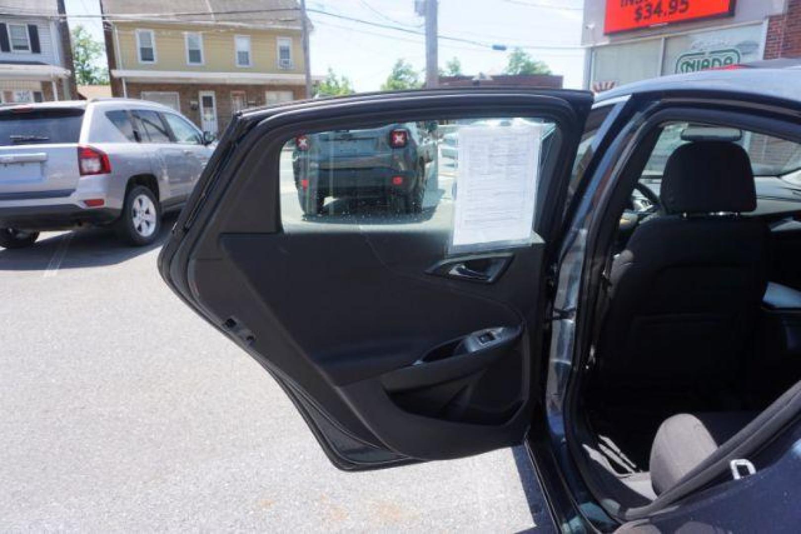 2021 Shadow Gray Metallic /Jet Black, premium cloth Chevrolet Malibu LS (1G1ZB5ST0MF) with an 1.5L L4 DOHC 16V engine, 6-Speed Automatic transmission, located at 312 Centre Ave, Schuylkill Haven, PA, 17972, (570) 593-5278, 40.638130, -76.177383 - Photo#34