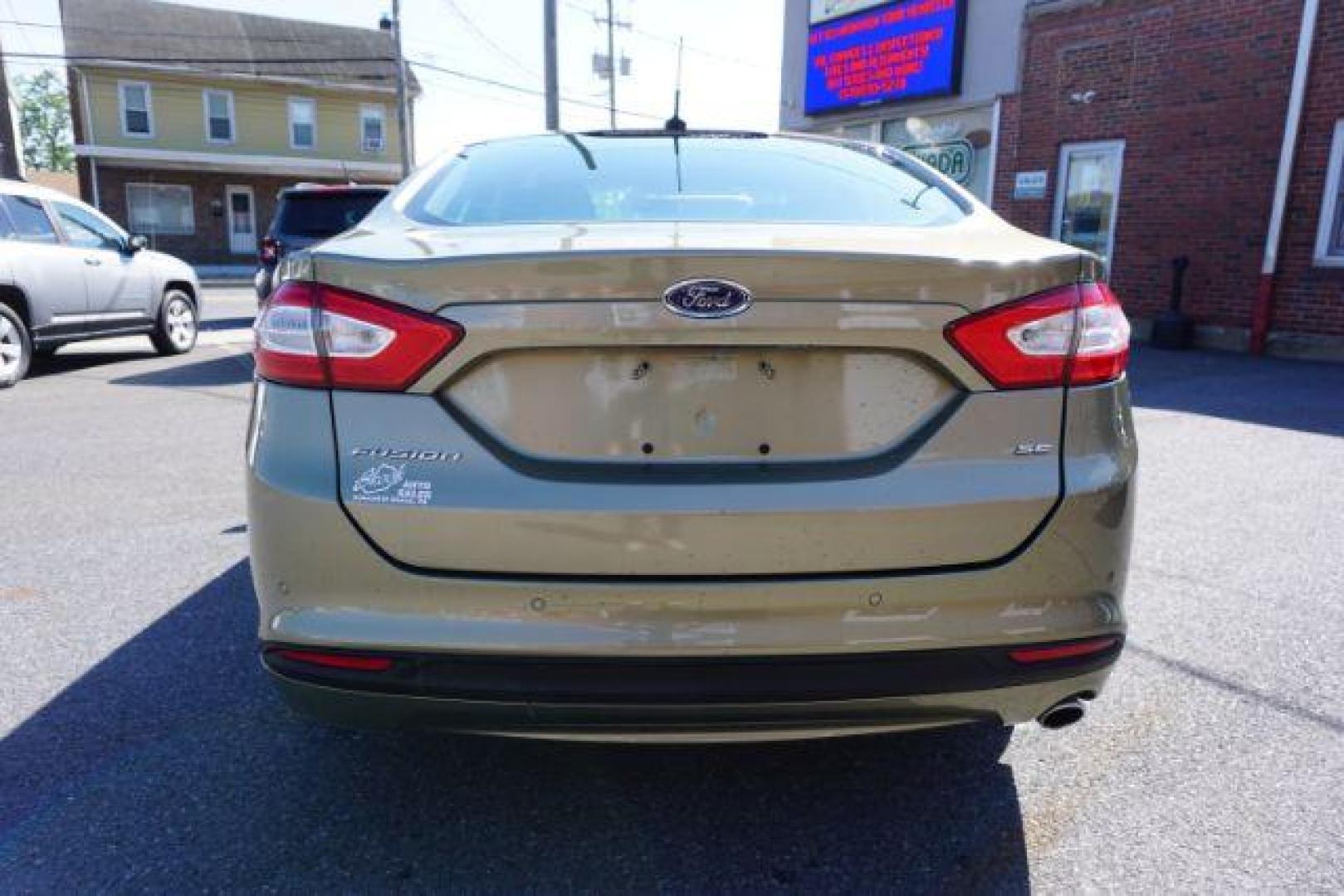 2013 Ginger Ale /Charcoal Black Ford Fusion SE (3FA6P0H76DR) with an 2.5L L4 DOHC 16V engine, located at 312 Centre Ave, Schuylkill Haven, PA, 17972, (570) 593-5278, 40.638130, -76.177383 - Photo#10