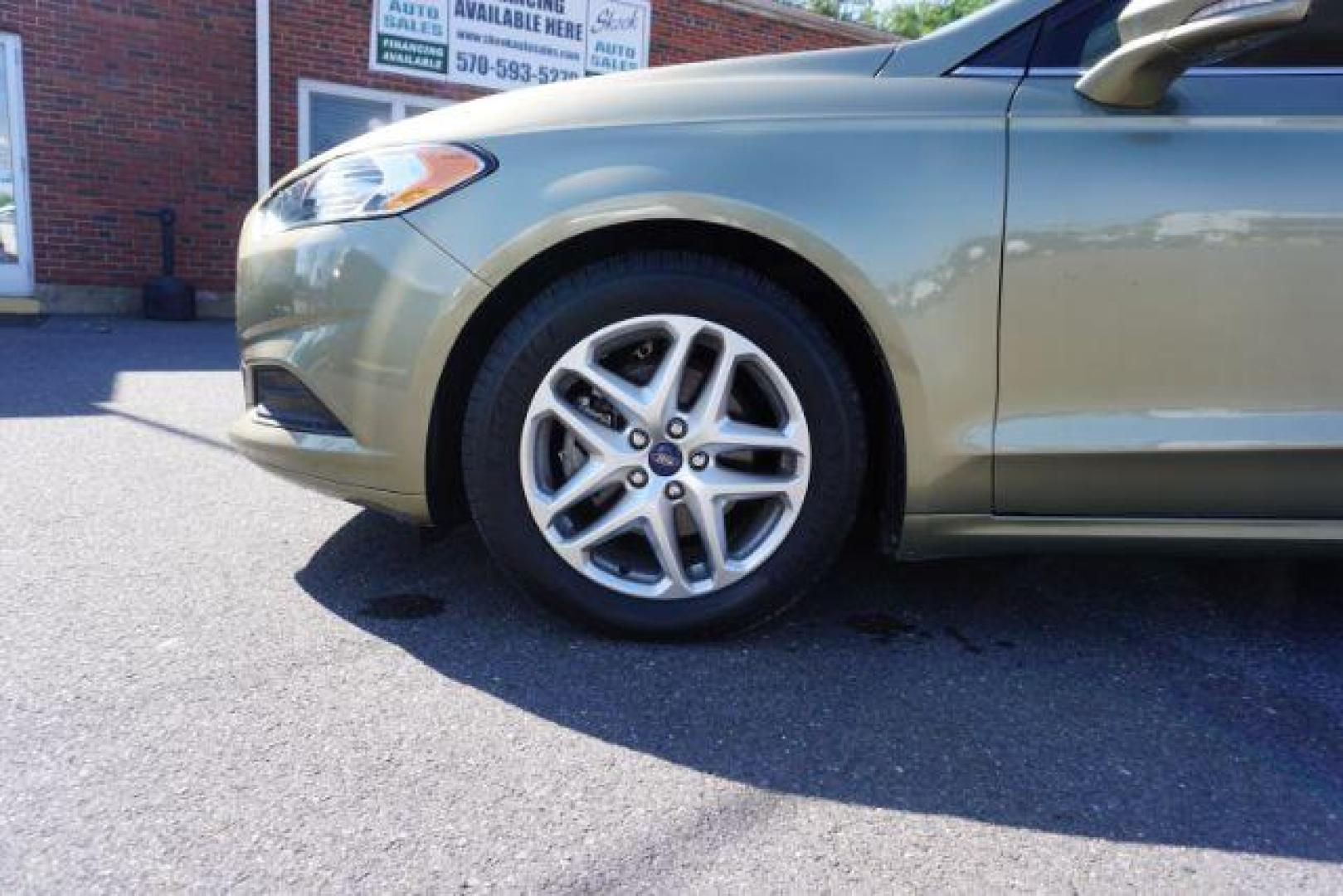 2013 Ginger Ale /Charcoal Black Ford Fusion SE (3FA6P0H76DR) with an 2.5L L4 DOHC 16V engine, located at 312 Centre Ave, Schuylkill Haven, PA, 17972, (570) 593-5278, 40.638130, -76.177383 - Photo#13