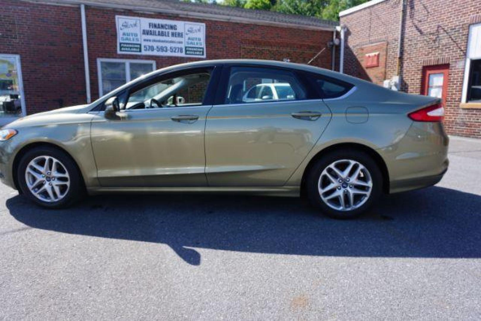 2013 Ginger Ale /Charcoal Black Ford Fusion SE (3FA6P0H76DR) with an 2.5L L4 DOHC 16V engine, located at 312 Centre Ave, Schuylkill Haven, PA, 17972, (570) 593-5278, 40.638130, -76.177383 - Photo#14