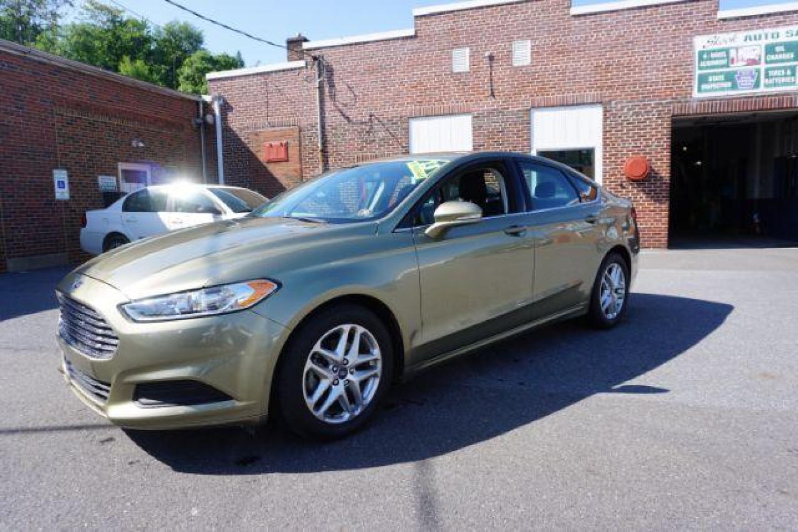 2013 Ginger Ale /Charcoal Black Ford Fusion SE (3FA6P0H76DR) with an 2.5L L4 DOHC 16V engine, located at 312 Centre Ave, Schuylkill Haven, PA, 17972, (570) 593-5278, 40.638130, -76.177383 - Photo#1