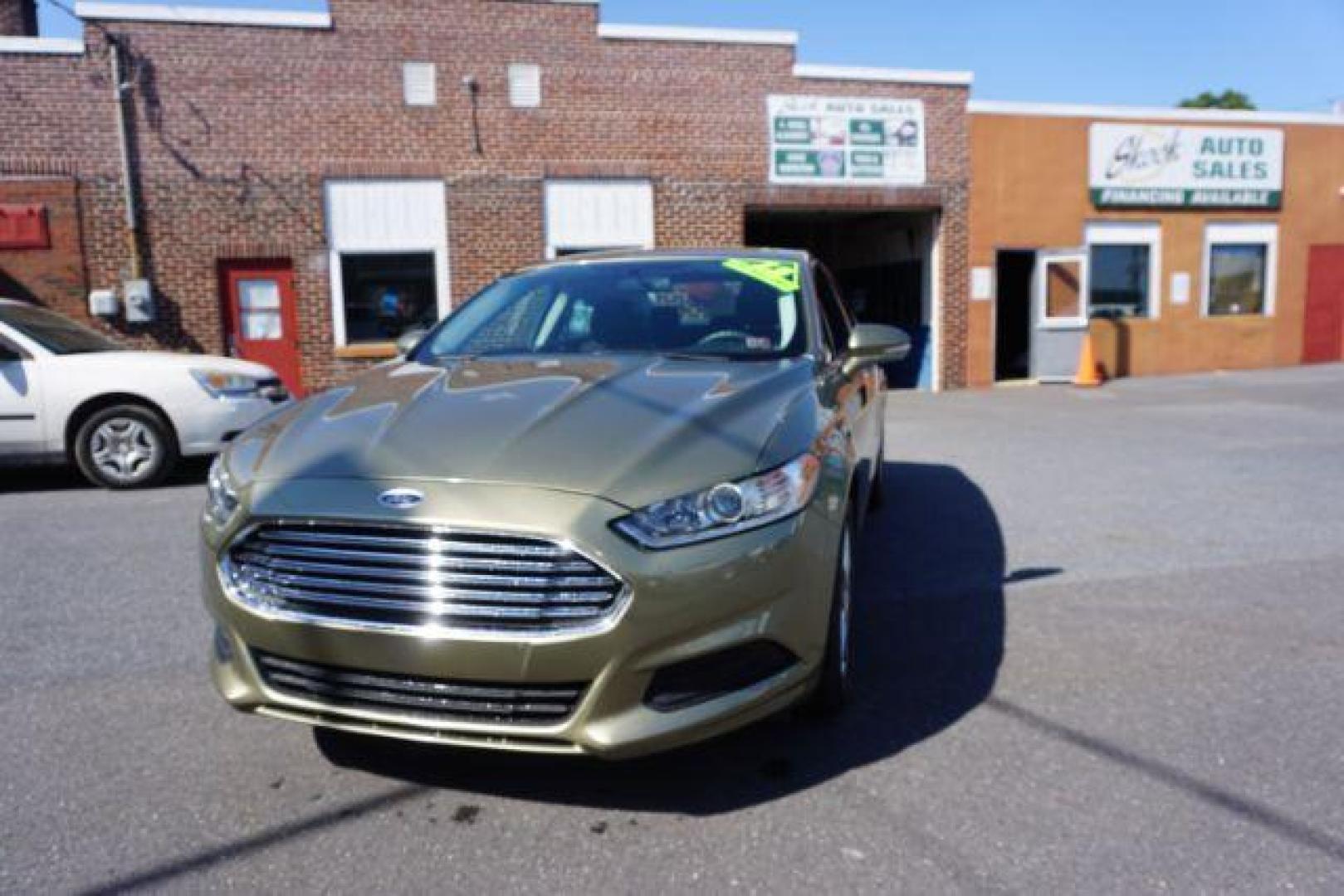 2013 Ginger Ale /Charcoal Black Ford Fusion SE (3FA6P0H76DR) with an 2.5L L4 DOHC 16V engine, located at 312 Centre Ave, Schuylkill Haven, PA, 17972, (570) 593-5278, 40.638130, -76.177383 - Photo#3