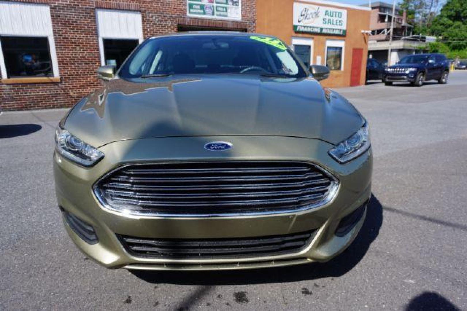 2013 Ginger Ale /Charcoal Black Ford Fusion SE (3FA6P0H76DR) with an 2.5L L4 DOHC 16V engine, located at 312 Centre Ave, Schuylkill Haven, PA, 17972, (570) 593-5278, 40.638130, -76.177383 - Photo#4