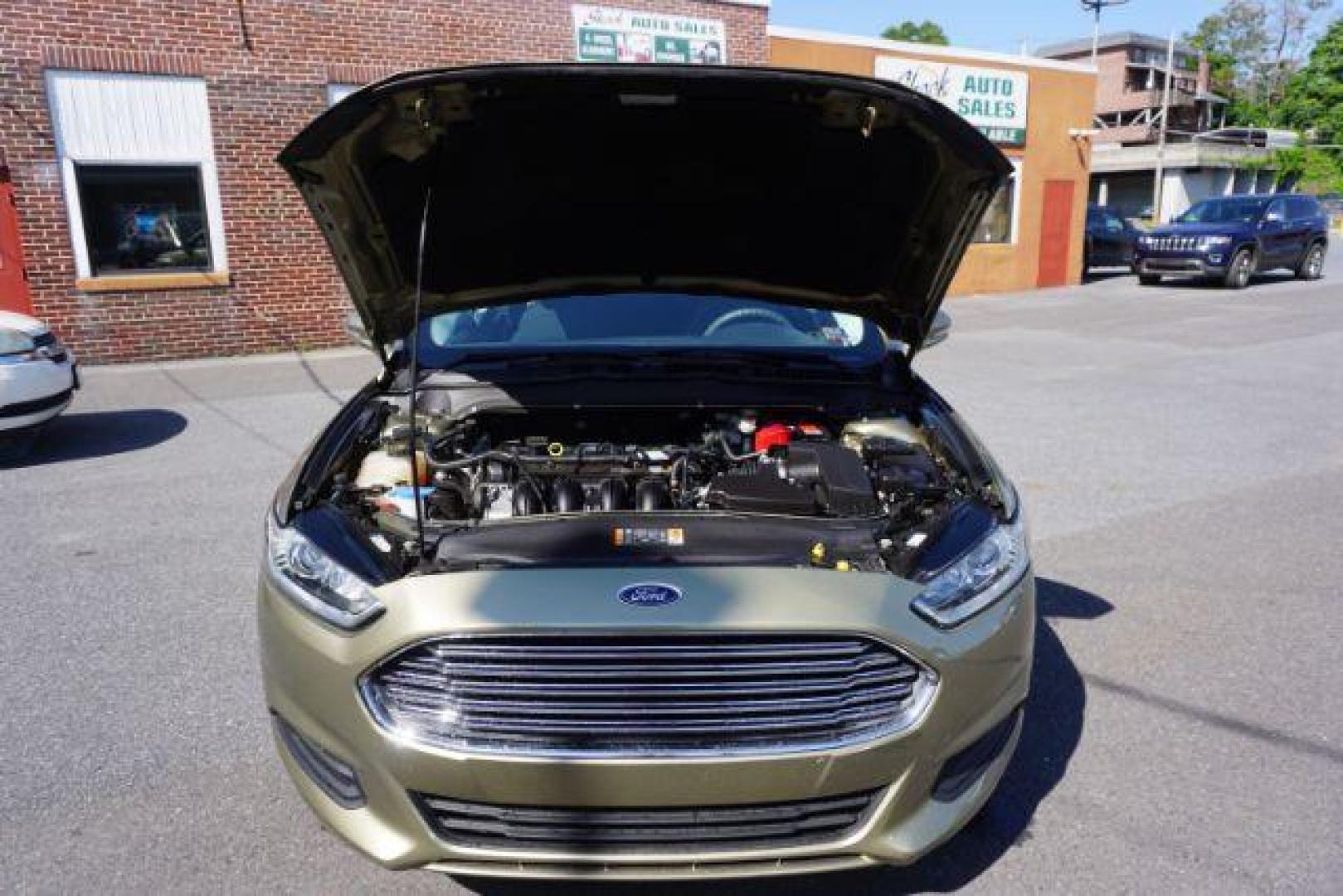 2013 Ginger Ale /Charcoal Black Ford Fusion SE (3FA6P0H76DR) with an 2.5L L4 DOHC 16V engine, located at 312 Centre Ave, Schuylkill Haven, PA, 17972, (570) 593-5278, 40.638130, -76.177383 - Photo#50