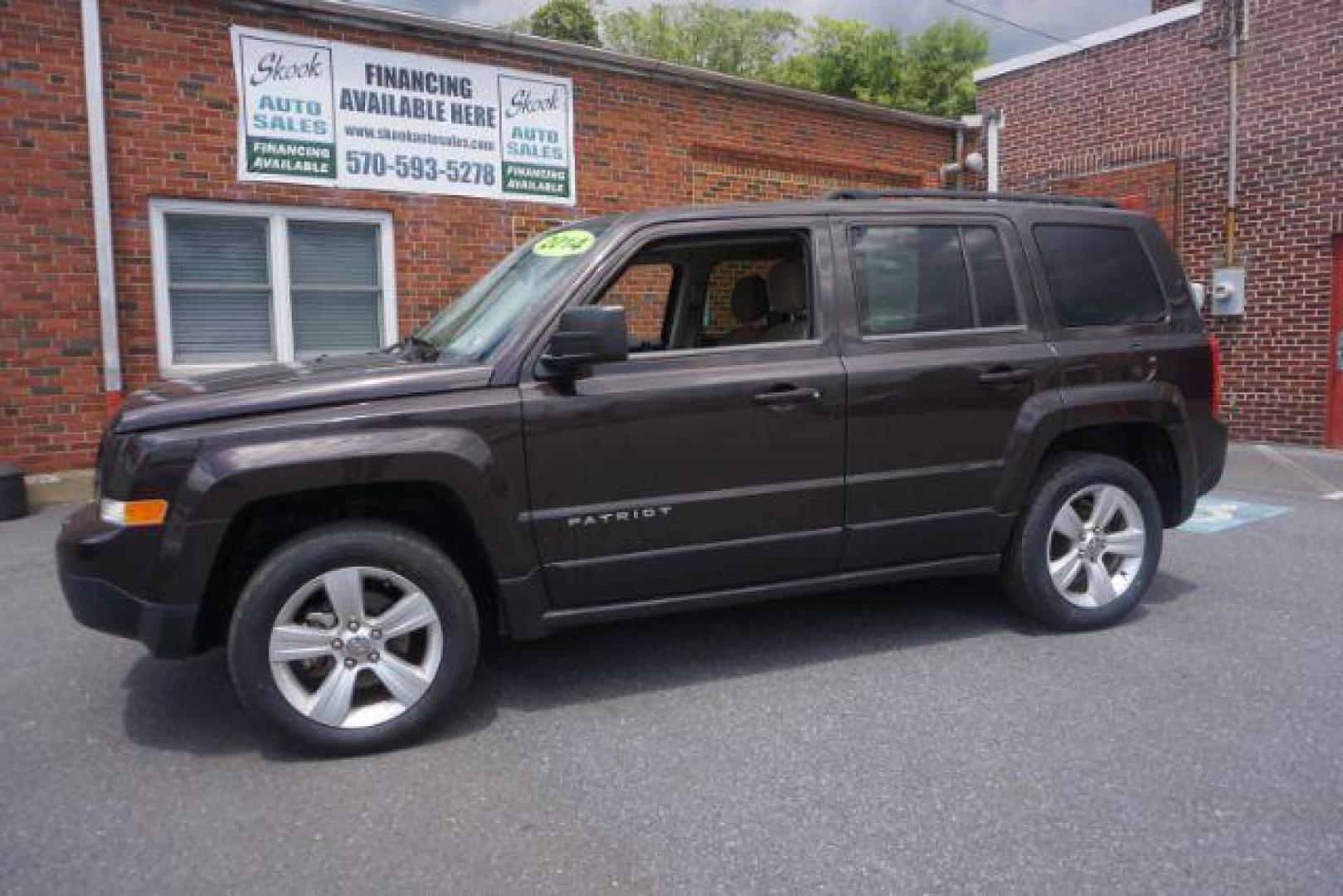 2014 Rugged Brown Pearlcoat /Light Pebble Beige/Dk Slate Jeep Patriot Latitude 4WD (1C4NJRFB3ED) with an 2.4L L4 DOHC 16V engine, Continuously Variable Transmission transmission, located at 312 Centre Ave, Schuylkill Haven, PA, 17972, (570) 593-5278, 40.638130, -76.177383 - Boston Accoustics stereo, locking/limited slip differential, power sunroof - Photo#0