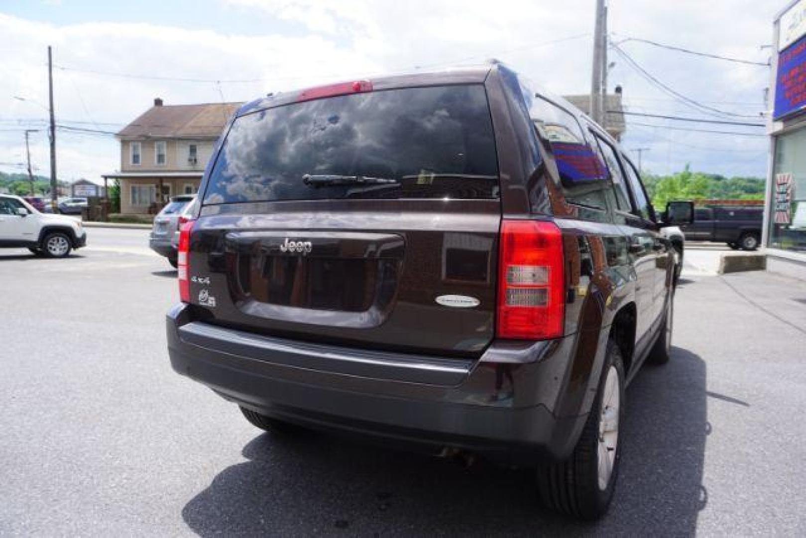 2014 Rugged Brown Pearlcoat /Light Pebble Beige/Dk Slate Jeep Patriot Latitude 4WD (1C4NJRFB3ED) with an 2.4L L4 DOHC 16V engine, Continuously Variable Transmission transmission, located at 312 Centre Ave, Schuylkill Haven, PA, 17972, (570) 593-5278, 40.638130, -76.177383 - Boston Accoustics stereo, locking/limited slip differential, power sunroof - Photo#11