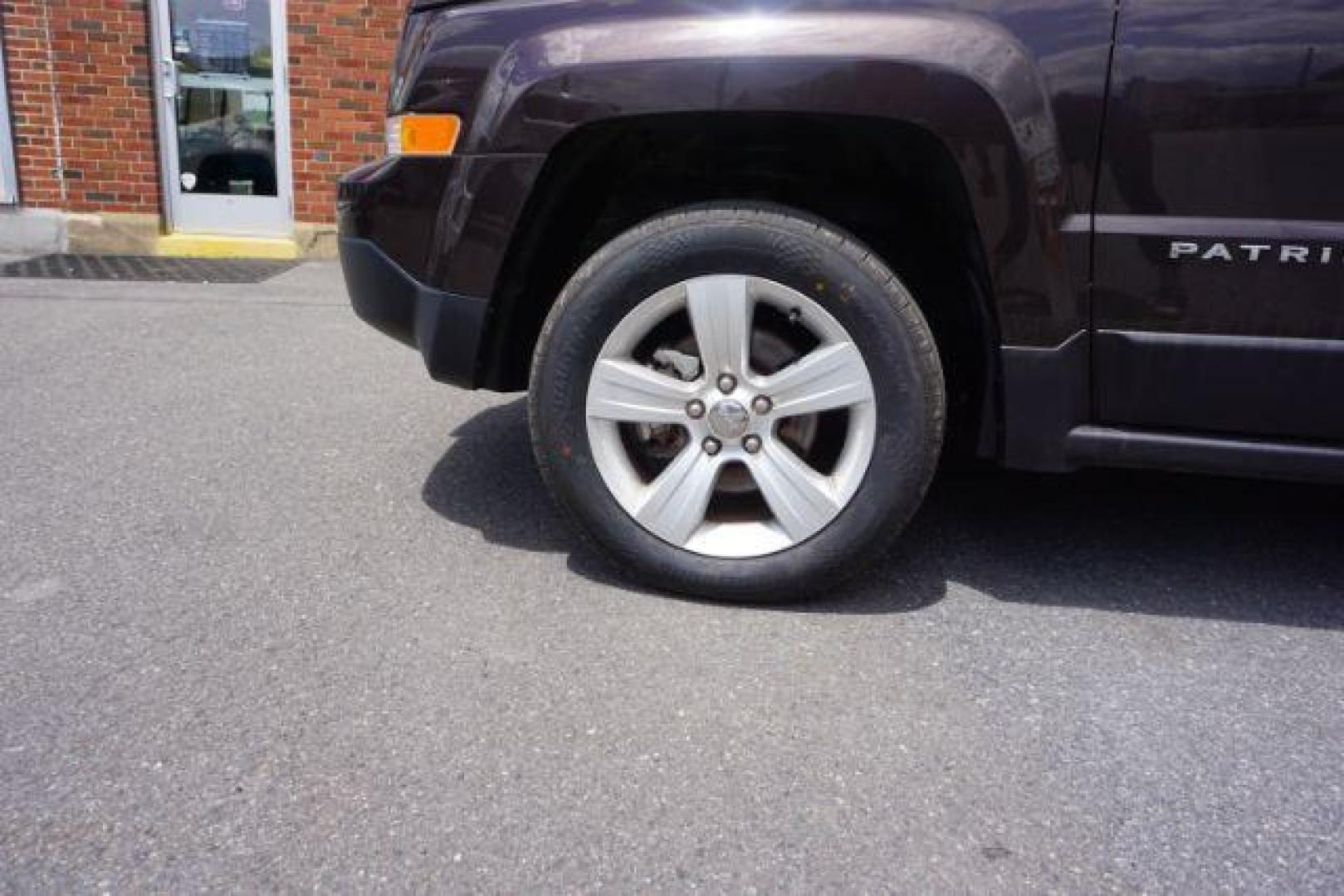 2014 Rugged Brown Pearlcoat /Light Pebble Beige/Dk Slate Jeep Patriot Latitude 4WD (1C4NJRFB3ED) with an 2.4L L4 DOHC 16V engine, Continuously Variable Transmission transmission, located at 312 Centre Ave, Schuylkill Haven, PA, 17972, (570) 593-5278, 40.638130, -76.177383 - Boston Accoustics stereo, locking/limited slip differential, power sunroof - Photo#15