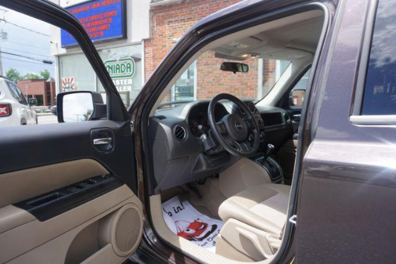 2014 Rugged Brown Pearlcoat /Light Pebble Beige/Dk Slate Jeep Patriot Latitude 4WD (1C4NJRFB3ED) with an 2.4L L4 DOHC 16V engine, Continuously Variable Transmission transmission, located at 312 Centre Ave, Schuylkill Haven, PA, 17972, (570) 593-5278, 40.638130, -76.177383 - Boston Accoustics stereo, locking/limited slip differential, power sunroof - Photo#18