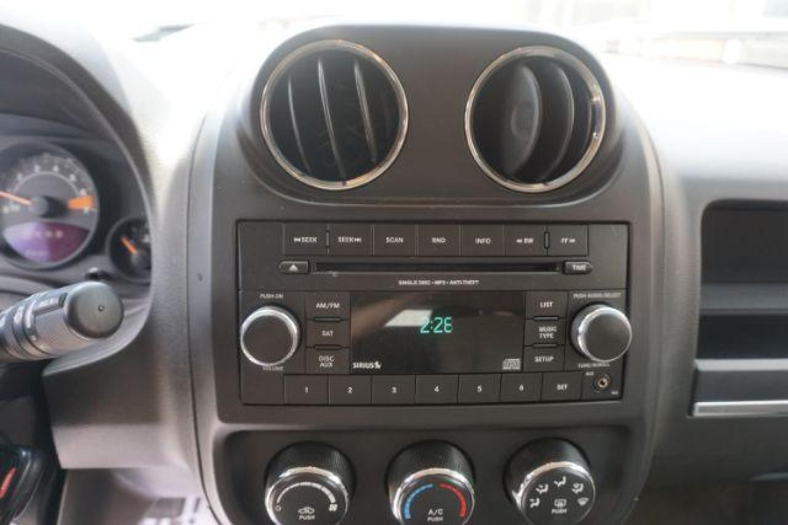 2014 Rugged Brown Pearlcoat /Light Pebble Beige/Dk Slate Jeep Patriot Latitude 4WD (1C4NJRFB3ED) with an 2.4L L4 DOHC 16V engine, Continuously Variable Transmission transmission, located at 312 Centre Ave, Schuylkill Haven, PA, 17972, (570) 593-5278, 40.638130, -76.177383 - Boston Accoustics stereo, locking/limited slip differential, power sunroof - Photo#25