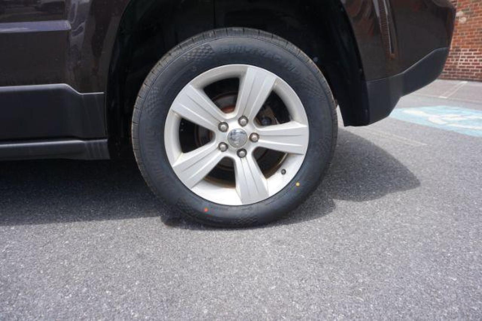 2014 Rugged Brown Pearlcoat /Light Pebble Beige/Dk Slate Jeep Patriot Latitude 4WD (1C4NJRFB3ED) with an 2.4L L4 DOHC 16V engine, Continuously Variable Transmission transmission, located at 312 Centre Ave, Schuylkill Haven, PA, 17972, (570) 593-5278, 40.638130, -76.177383 - Boston Accoustics stereo, locking/limited slip differential, power sunroof - Photo#2