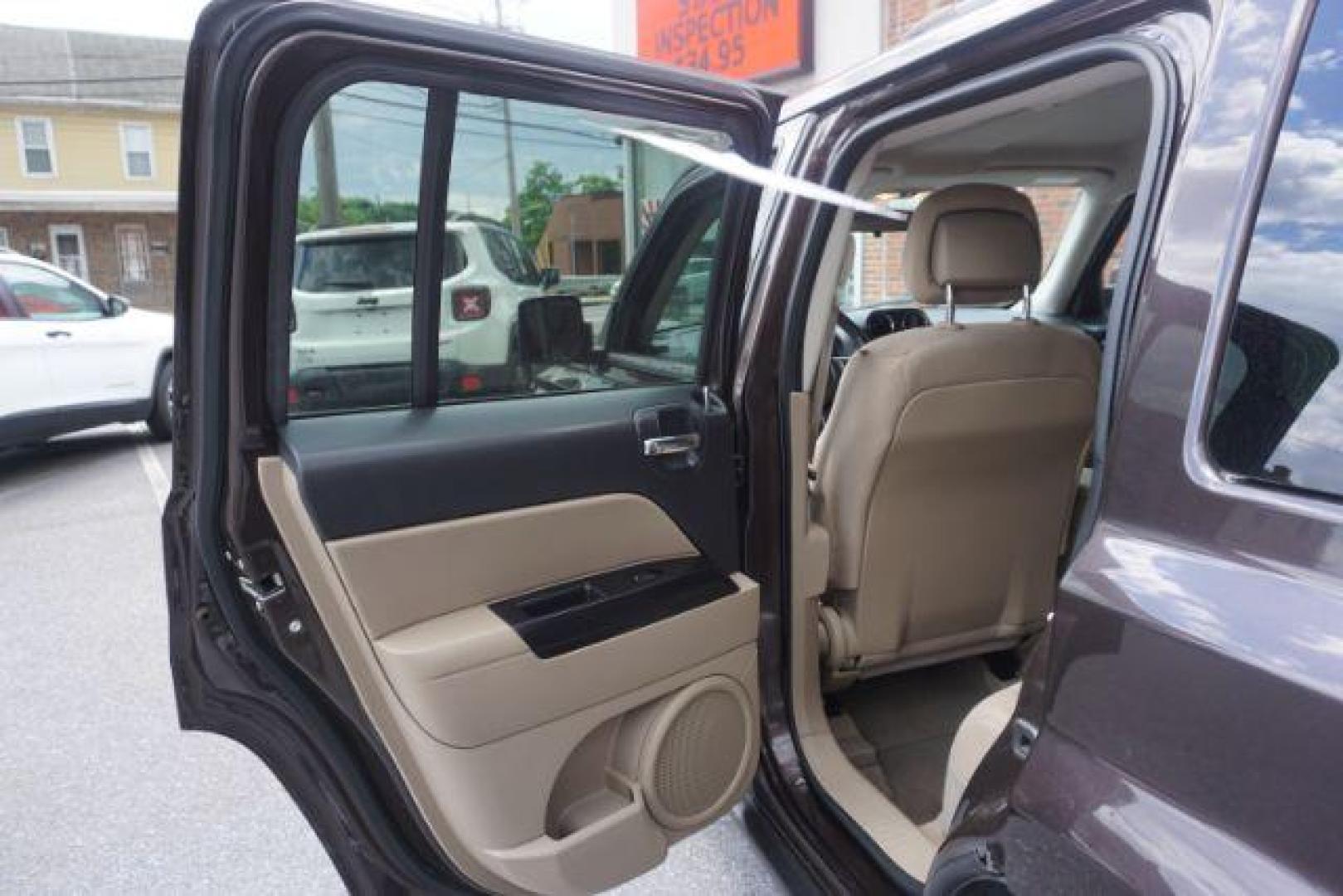 2014 Rugged Brown Pearlcoat /Light Pebble Beige/Dk Slate Jeep Patriot Latitude 4WD (1C4NJRFB3ED) with an 2.4L L4 DOHC 16V engine, Continuously Variable Transmission transmission, located at 312 Centre Ave, Schuylkill Haven, PA, 17972, (570) 593-5278, 40.638130, -76.177383 - Boston Accoustics stereo, locking/limited slip differential, power sunroof - Photo#29