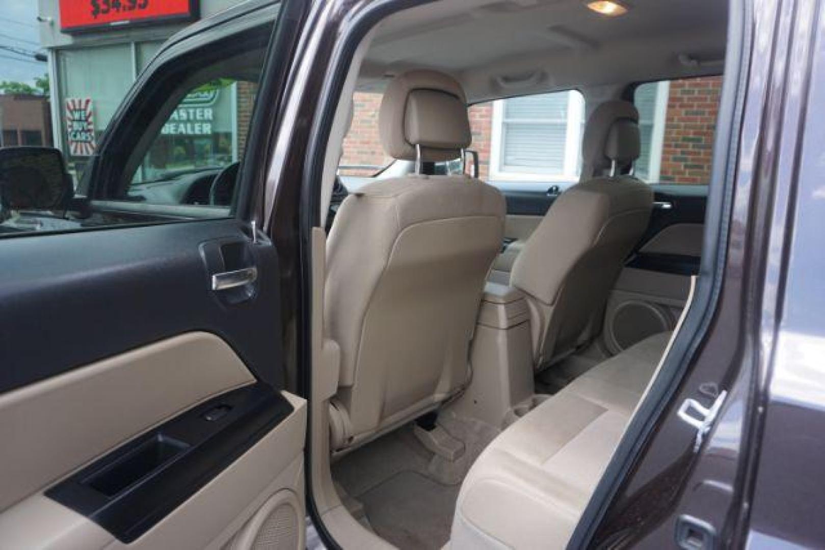 2014 Rugged Brown Pearlcoat /Light Pebble Beige/Dk Slate Jeep Patriot Latitude 4WD (1C4NJRFB3ED) with an 2.4L L4 DOHC 16V engine, Continuously Variable Transmission transmission, located at 312 Centre Ave, Schuylkill Haven, PA, 17972, (570) 593-5278, 40.638130, -76.177383 - Boston Accoustics stereo, locking/limited slip differential, power sunroof - Photo#31