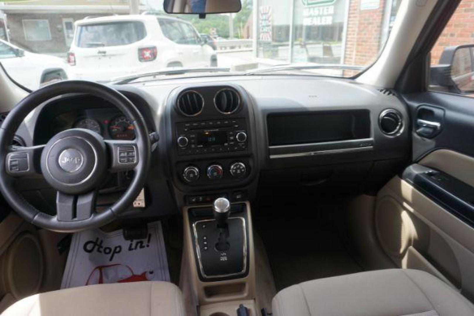 2014 Rugged Brown Pearlcoat /Light Pebble Beige/Dk Slate Jeep Patriot Latitude 4WD (1C4NJRFB3ED) with an 2.4L L4 DOHC 16V engine, Continuously Variable Transmission transmission, located at 312 Centre Ave, Schuylkill Haven, PA, 17972, (570) 593-5278, 40.638130, -76.177383 - Boston Accoustics stereo, locking/limited slip differential, power sunroof - Photo#36