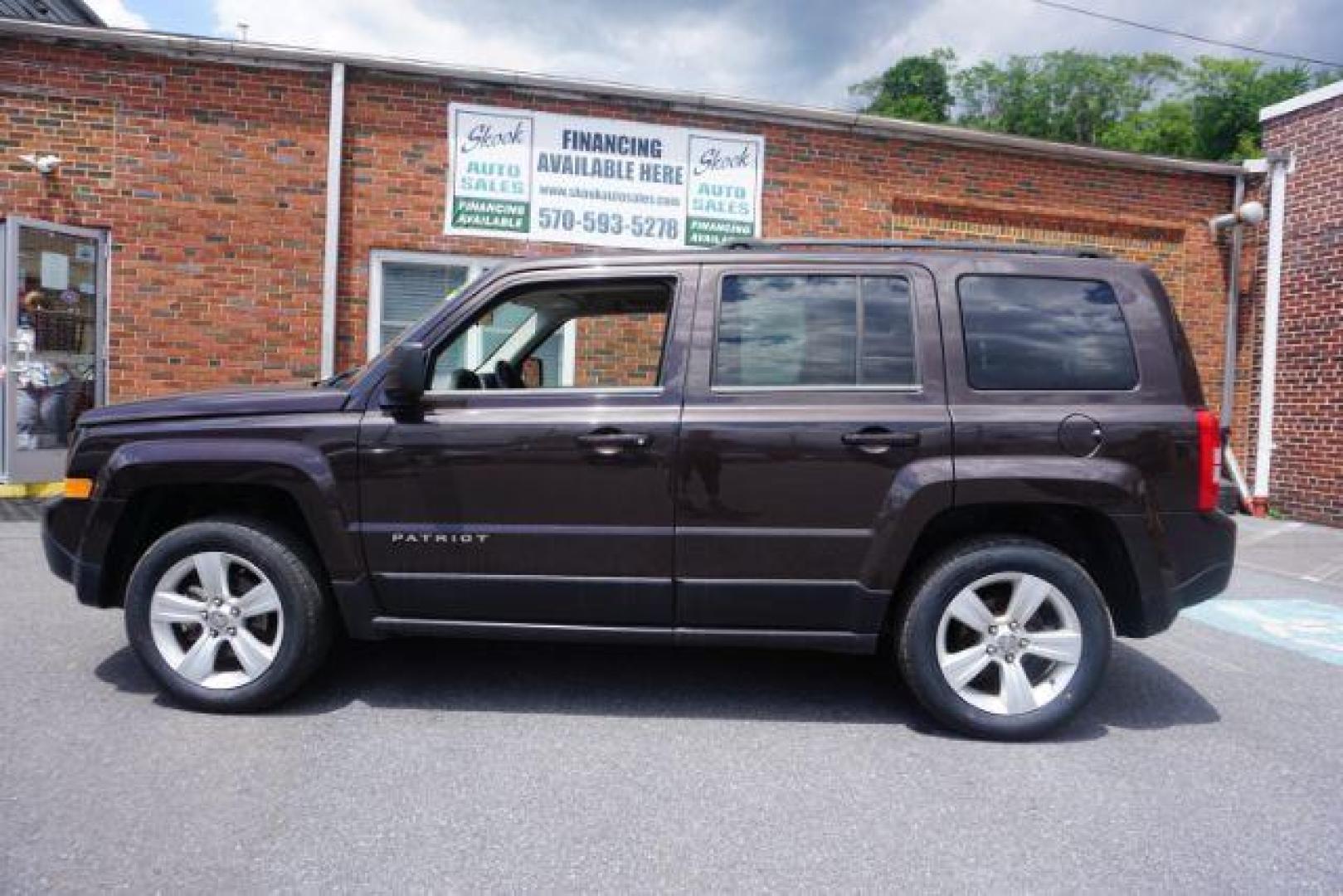 2014 Rugged Brown Pearlcoat /Light Pebble Beige/Dk Slate Jeep Patriot Latitude 4WD (1C4NJRFB3ED) with an 2.4L L4 DOHC 16V engine, Continuously Variable Transmission transmission, located at 312 Centre Ave, Schuylkill Haven, PA, 17972, (570) 593-5278, 40.638130, -76.177383 - Boston Accoustics stereo, locking/limited slip differential, power sunroof - Photo#3