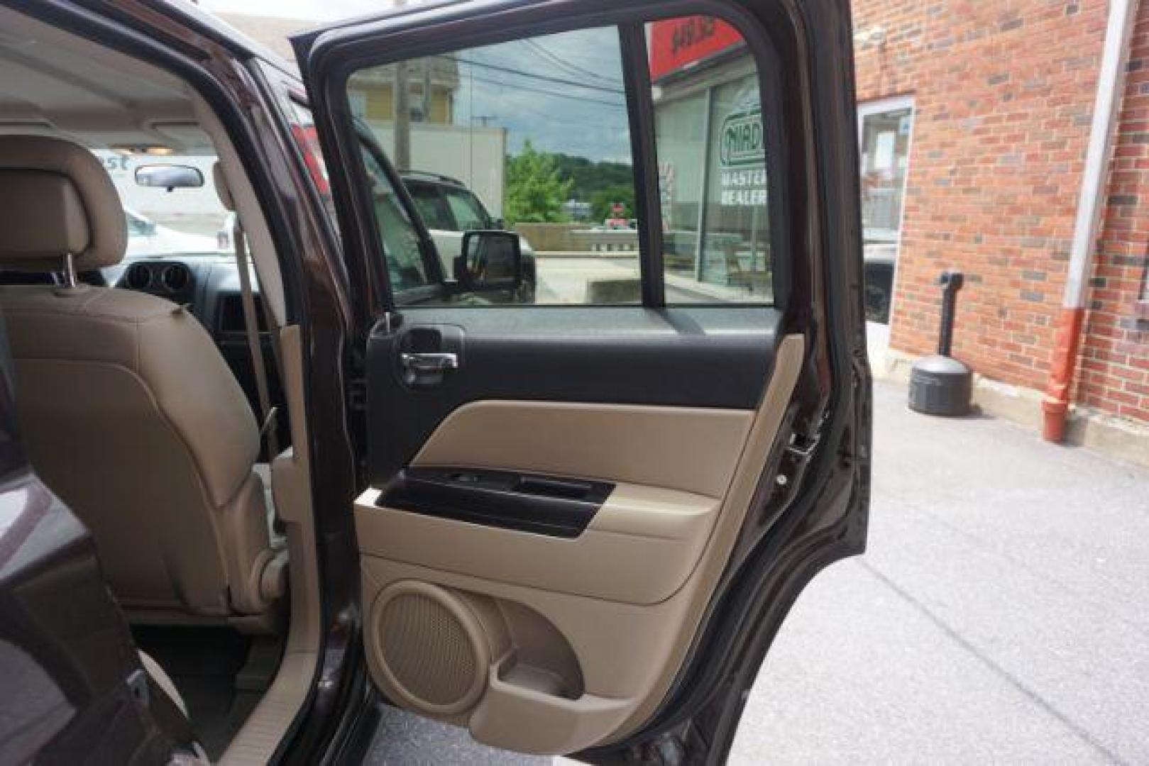 2014 Rugged Brown Pearlcoat /Light Pebble Beige/Dk Slate Jeep Patriot Latitude 4WD (1C4NJRFB3ED) with an 2.4L L4 DOHC 16V engine, Continuously Variable Transmission transmission, located at 312 Centre Ave, Schuylkill Haven, PA, 17972, (570) 593-5278, 40.638130, -76.177383 - Boston Accoustics stereo, locking/limited slip differential, power sunroof - Photo#39