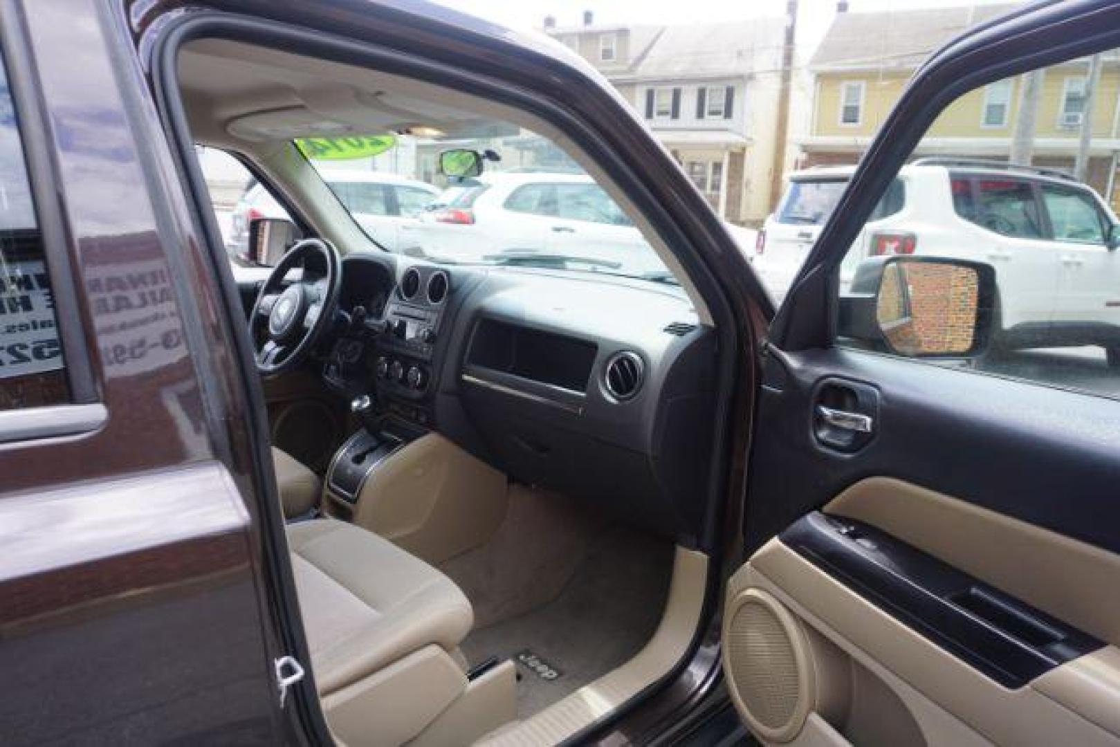 2014 Rugged Brown Pearlcoat /Light Pebble Beige/Dk Slate Jeep Patriot Latitude 4WD (1C4NJRFB3ED) with an 2.4L L4 DOHC 16V engine, Continuously Variable Transmission transmission, located at 312 Centre Ave, Schuylkill Haven, PA, 17972, (570) 593-5278, 40.638130, -76.177383 - Boston Accoustics stereo, locking/limited slip differential, power sunroof - Photo#45