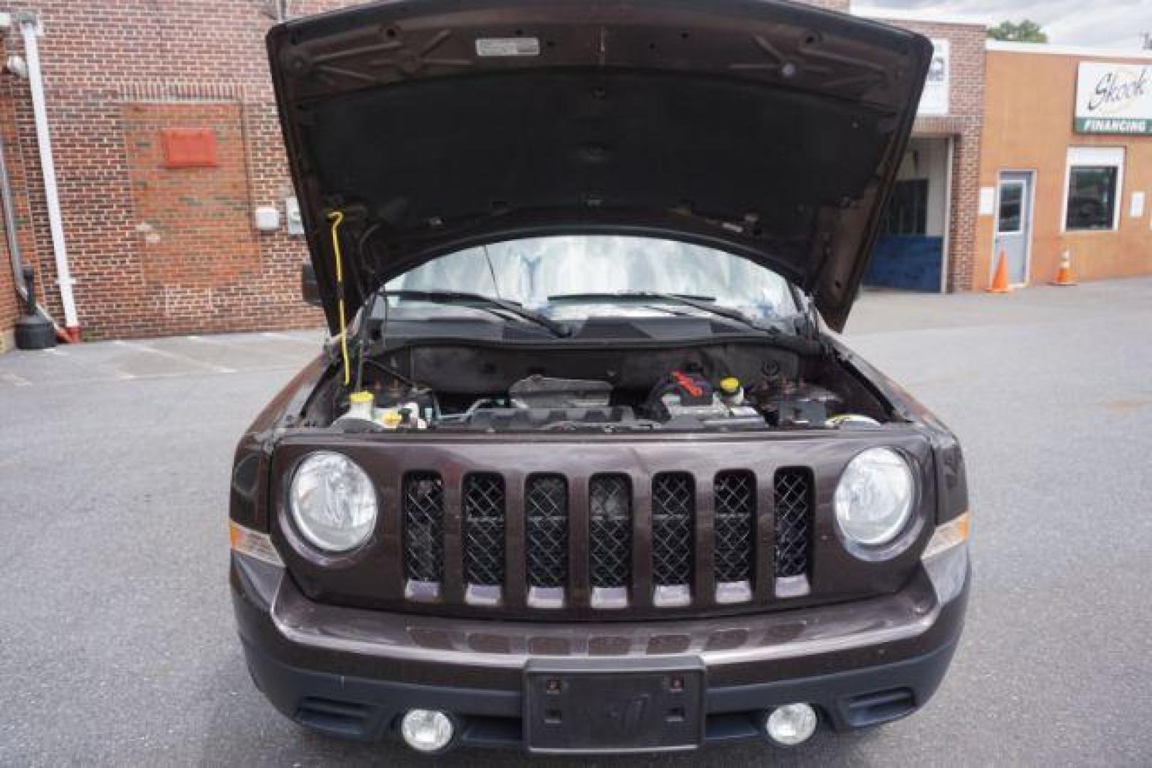 2014 Rugged Brown Pearlcoat /Light Pebble Beige/Dk Slate Jeep Patriot Latitude 4WD (1C4NJRFB3ED) with an 2.4L L4 DOHC 16V engine, Continuously Variable Transmission transmission, located at 312 Centre Ave, Schuylkill Haven, PA, 17972, (570) 593-5278, 40.638130, -76.177383 - Boston Accoustics stereo, locking/limited slip differential, power sunroof - Photo#50