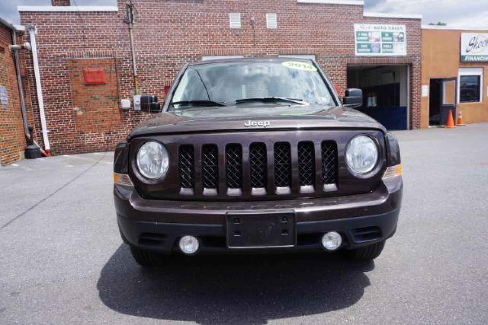 2014 Rugged Brown Pearlcoat /Light Pebble Beige/Dk Slate Jeep Patriot Latitude 4WD (1C4NJRFB3ED) with an 2.4L L4 DOHC 16V engine, Continuously Variable Transmission transmission, located at 312 Centre Ave, Schuylkill Haven, PA, 17972, (570) 593-5278, 40.638130, -76.177383 - Boston Accoustics stereo, locking/limited slip differential, power sunroof - Photo#5