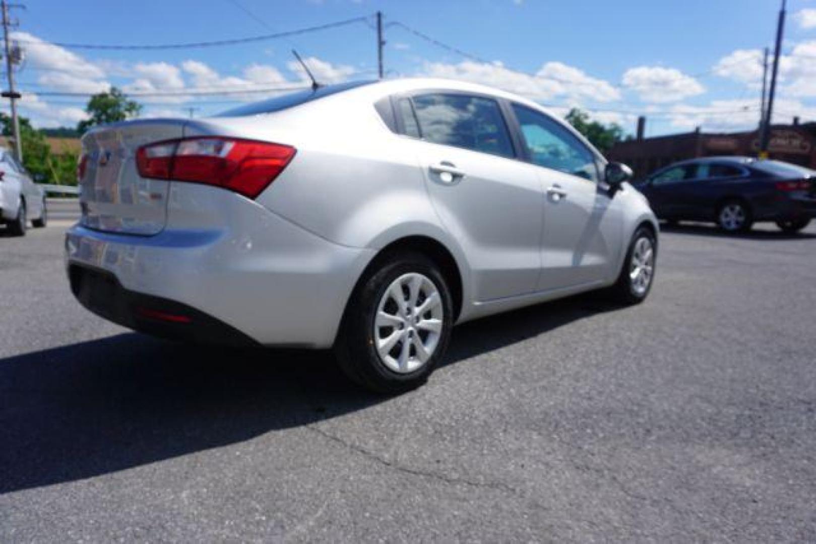 2014 Bright Silver /Black Kia Rio LX (KNADM4A36E6) with an 1.6L L4 DOHC 16V engine, located at 312 Centre Ave, Schuylkill Haven, PA, 17972, (570) 593-5278, 40.638130, -76.177383 - aluminum/alloy wheels - Photo#9