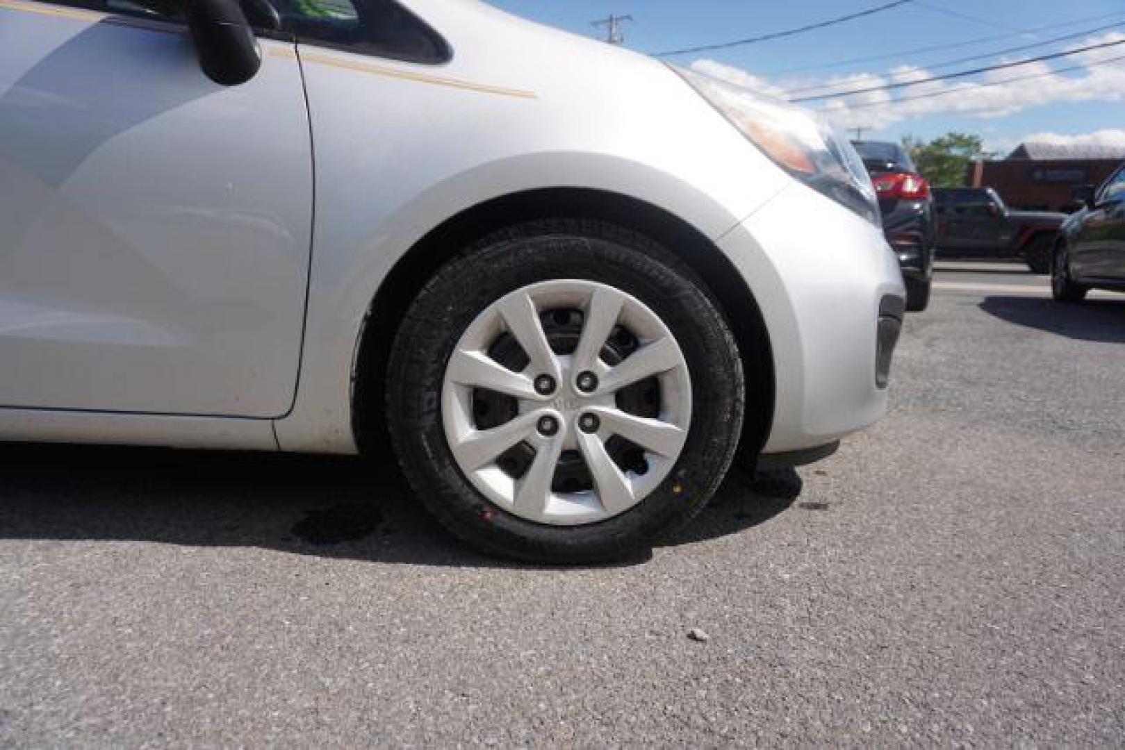 2014 Bright Silver /Black Kia Rio LX (KNADM4A36E6) with an 1.6L L4 DOHC 16V engine, located at 312 Centre Ave, Schuylkill Haven, PA, 17972, (570) 593-5278, 40.638130, -76.177383 - aluminum/alloy wheels - Photo#11