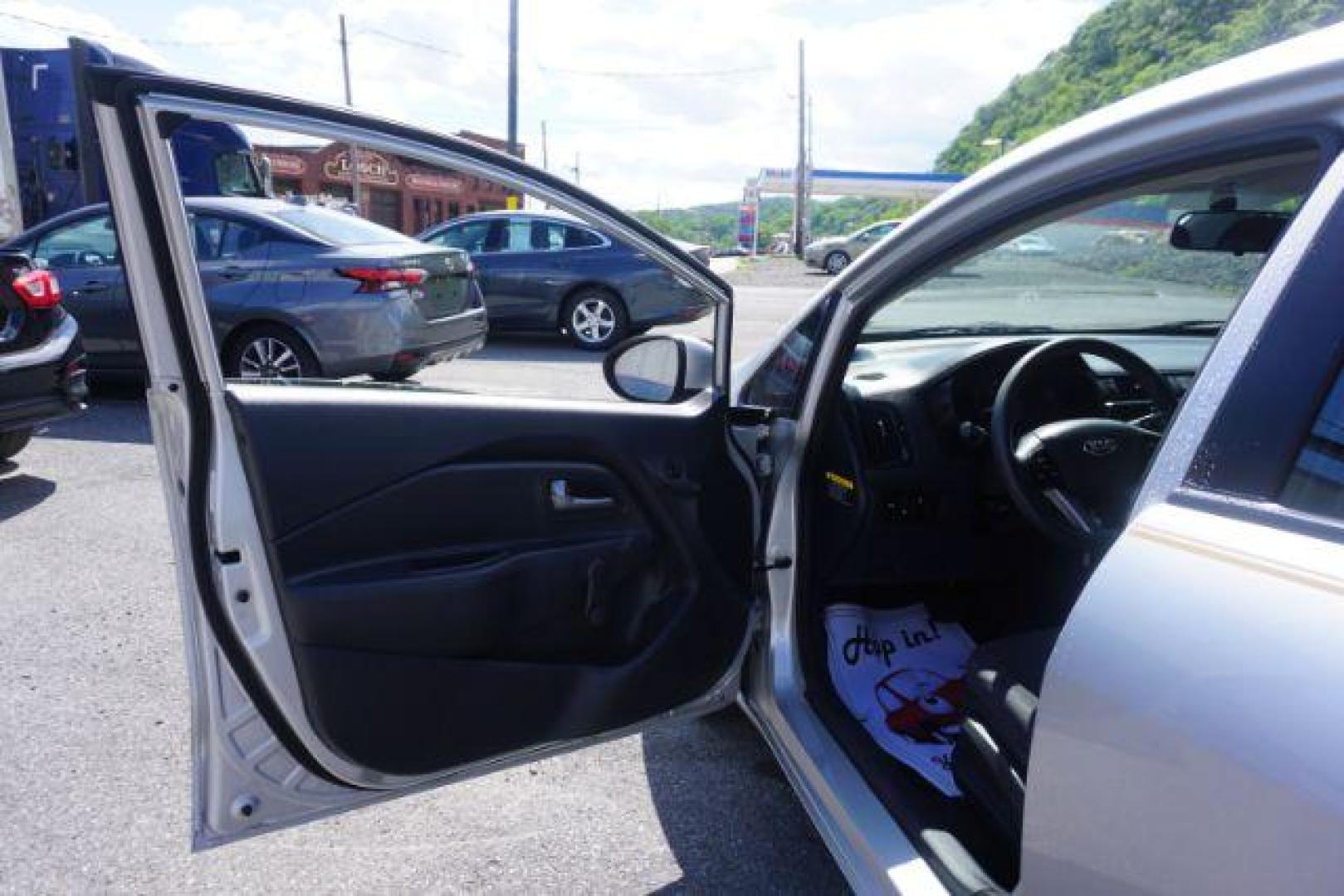 2014 Bright Silver /Black Kia Rio LX (KNADM4A36E6) with an 1.6L L4 DOHC 16V engine, located at 312 Centre Ave, Schuylkill Haven, PA, 17972, (570) 593-5278, 40.638130, -76.177383 - aluminum/alloy wheels - Photo#13