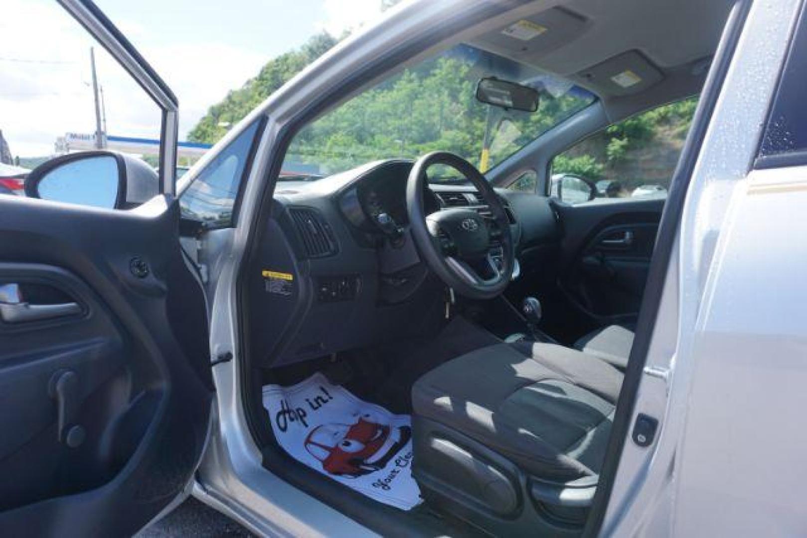 2014 Bright Silver /Black Kia Rio LX (KNADM4A36E6) with an 1.6L L4 DOHC 16V engine, located at 312 Centre Ave, Schuylkill Haven, PA, 17972, (570) 593-5278, 40.638130, -76.177383 - aluminum/alloy wheels - Photo#15