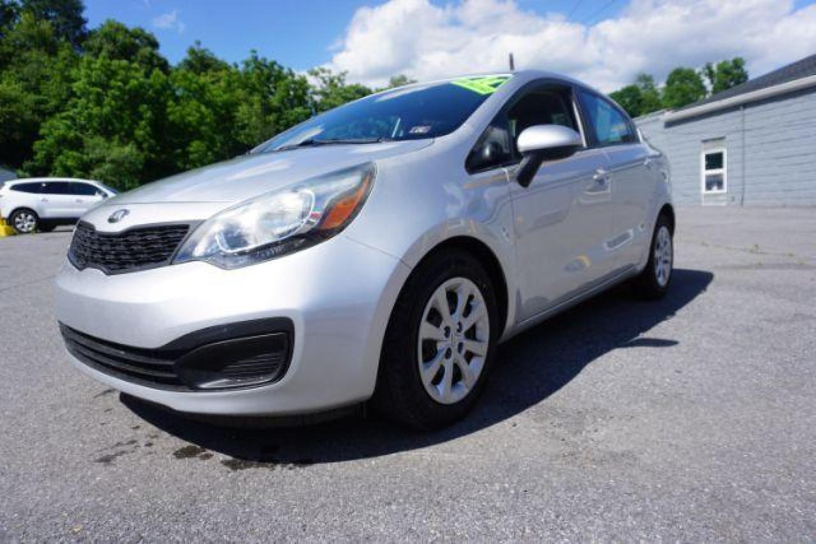 2014 Bright Silver /Black Kia Rio LX (KNADM4A36E6) with an 1.6L L4 DOHC 16V engine, located at 312 Centre Ave, Schuylkill Haven, PA, 17972, (570) 593-5278, 40.638130, -76.177383 - aluminum/alloy wheels - Photo#2