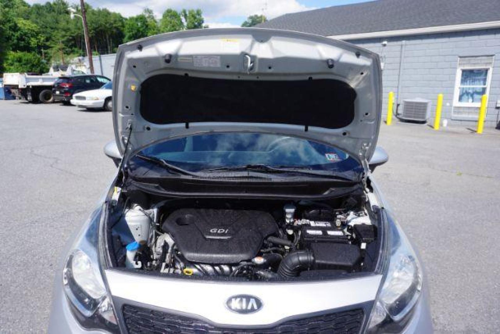 2014 Bright Silver /Black Kia Rio LX (KNADM4A36E6) with an 1.6L L4 DOHC 16V engine, located at 312 Centre Ave, Schuylkill Haven, PA, 17972, (570) 593-5278, 40.638130, -76.177383 - aluminum/alloy wheels - Photo#48