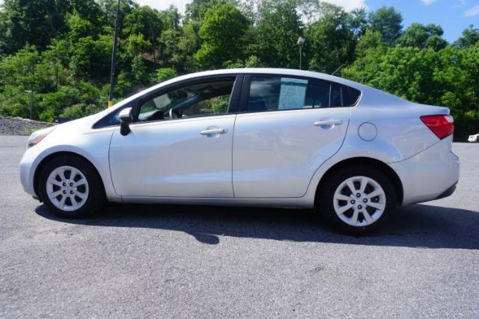 2014 Bright Silver /Black Kia Rio LX (KNADM4A36E6) with an 1.6L L4 DOHC 16V engine, located at 312 Centre Ave, Schuylkill Haven, PA, 17972, (570) 593-5278, 40.638130, -76.177383 - aluminum/alloy wheels - Photo#5