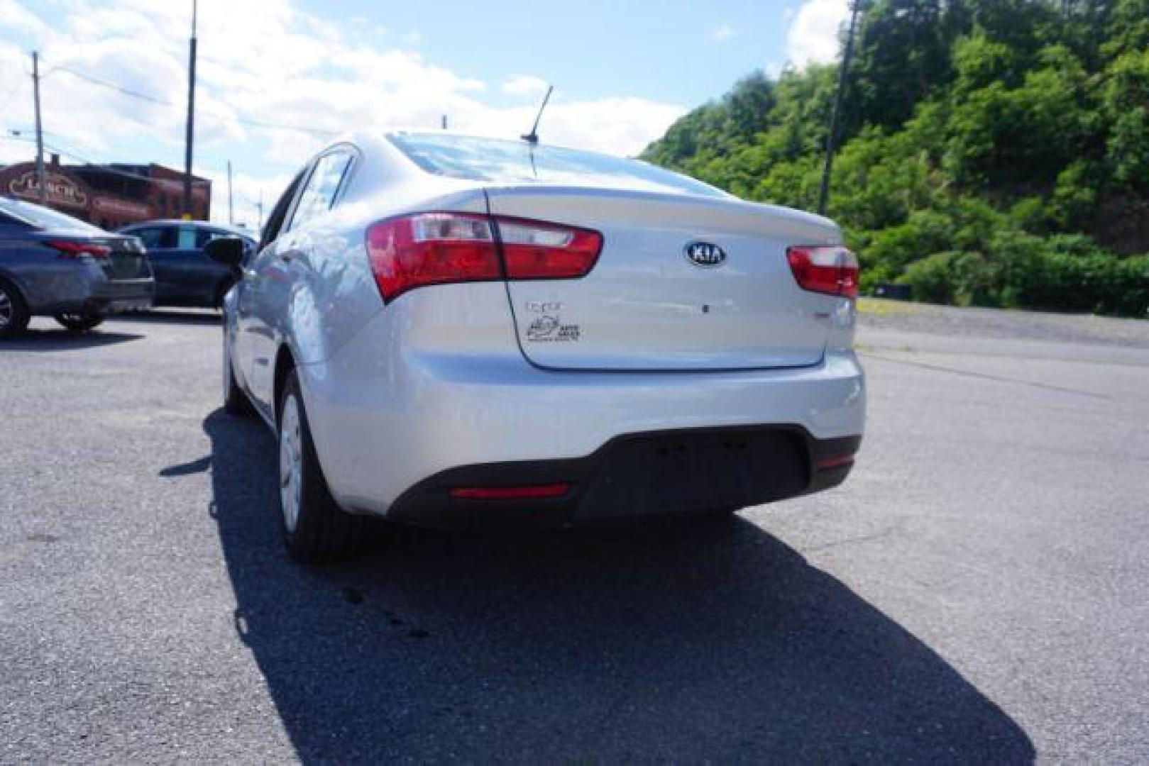 2014 Bright Silver /Black Kia Rio LX (KNADM4A36E6) with an 1.6L L4 DOHC 16V engine, located at 312 Centre Ave, Schuylkill Haven, PA, 17972, (570) 593-5278, 40.638130, -76.177383 - aluminum/alloy wheels - Photo#6