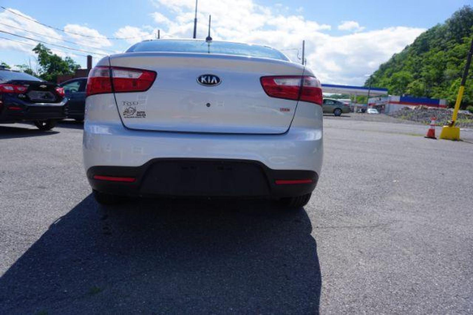 2014 Bright Silver /Black Kia Rio LX (KNADM4A36E6) with an 1.6L L4 DOHC 16V engine, located at 312 Centre Ave, Schuylkill Haven, PA, 17972, (570) 593-5278, 40.638130, -76.177383 - aluminum/alloy wheels - Photo#7