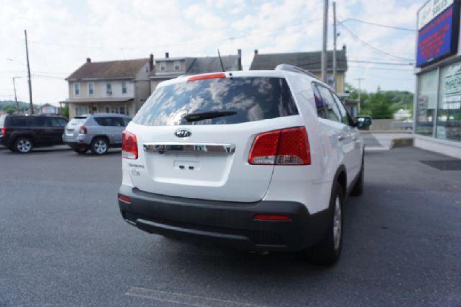 2013 Snow White Pearl /Beige Cloth Interior Kia Sorento LX 2WD (5XYKT3A67DG) with an 2.4L L4 DOHC 16V engine, 6-Speed Automatic transmission, located at 312 Centre Ave, Schuylkill Haven, PA, 17972, (570) 593-5278, 40.638130, -76.177383 - Photo#14