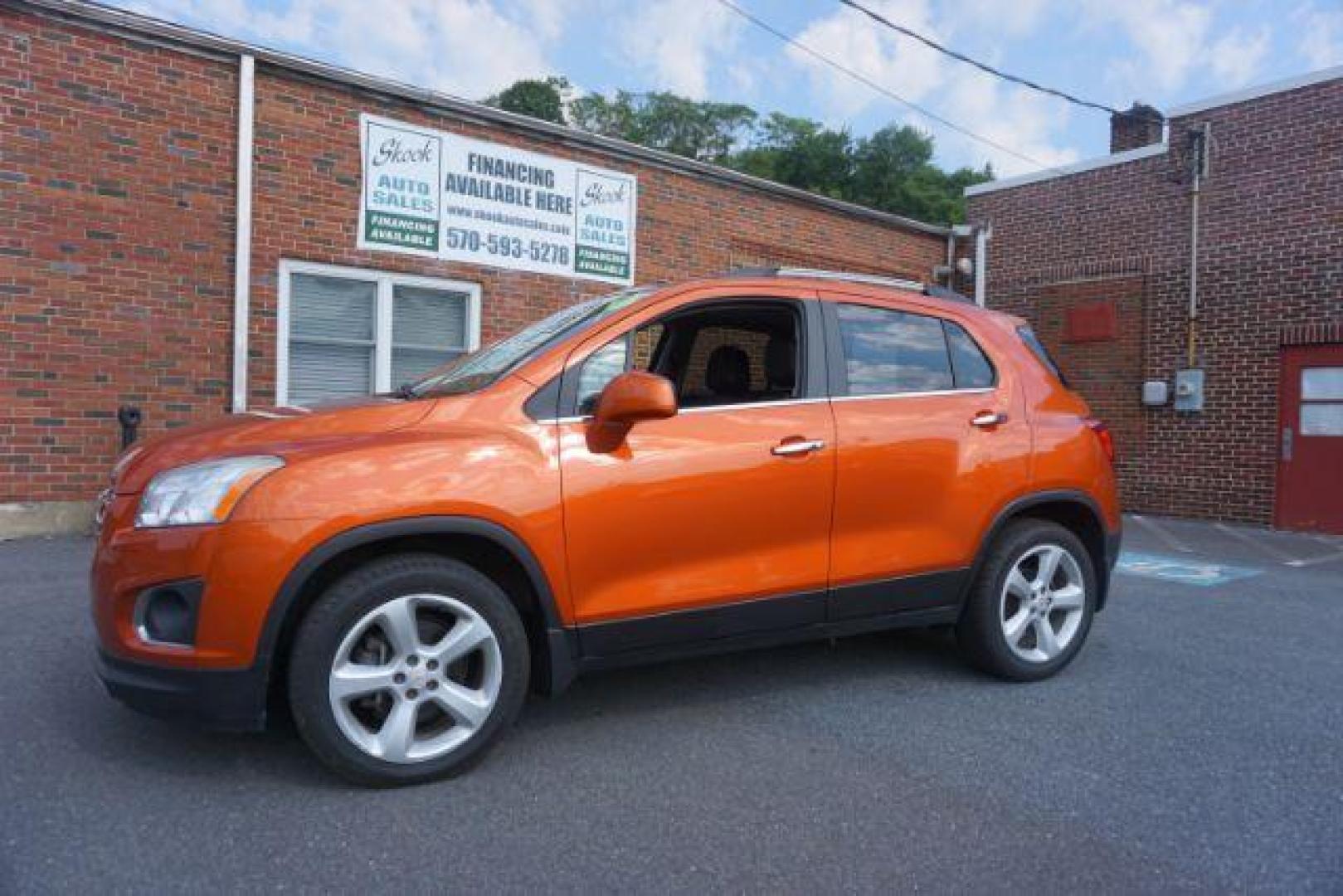 2015 Orange Rock Metallic /Jet Black, leatherette/cloth Chevrolet Trax LT AWD (KL7CJTSB6FB) with an 1.4L L4 DOHC 16V engine, 6-Speed Automatic transmission, located at 312 Centre Ave, Schuylkill Haven, PA, 17972, (570) 593-5278, 40.638130, -76.177383 - Photo#0