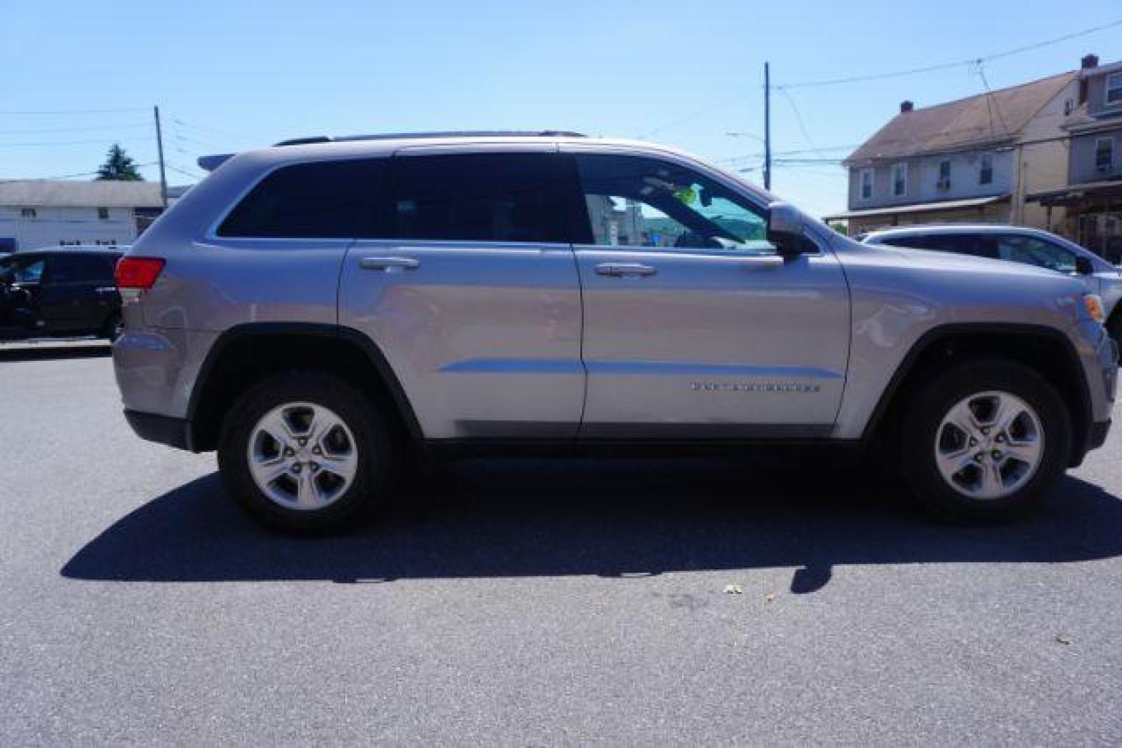 2016 Billet Silver Metallic Clear Coat Jeep Grand Cherokee SPORT UTILITY 4-DR (1C4RJFAG5GC) with an 3.6L V6 DOHC 24V engine, 8-Speed Automatic transmission, located at 312 Centre Ave, Schuylkill Haven, PA, 17972, (570) 593-5278, 40.638130, -76.177383 - navigation system, power liftgate, rear parking sensors, universal garage door opener - Photo#9