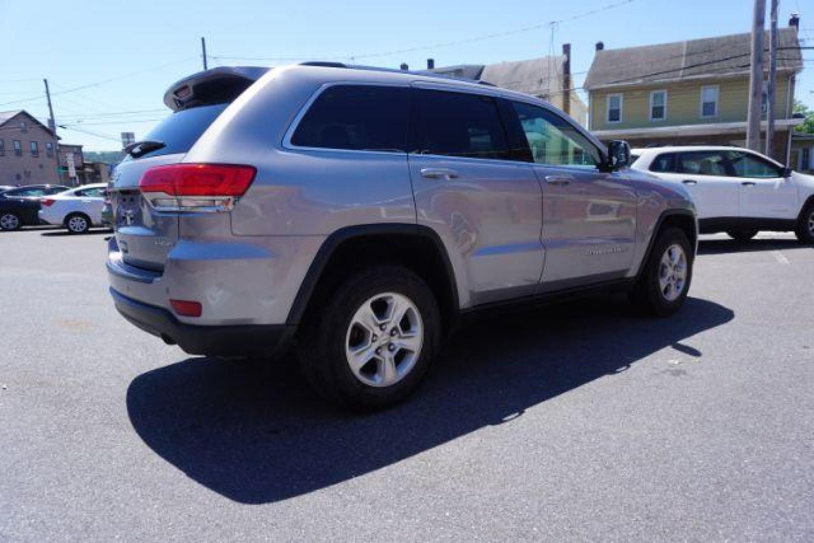 2016 Billet Silver Metallic Clear Coat Jeep Grand Cherokee SPORT UTILITY 4-DR (1C4RJFAG5GC) with an 3.6L V6 DOHC 24V engine, 8-Speed Automatic transmission, located at 312 Centre Ave, Schuylkill Haven, PA, 17972, (570) 593-5278, 40.638130, -76.177383 - navigation system, power liftgate, rear parking sensors, universal garage door opener - Photo#10