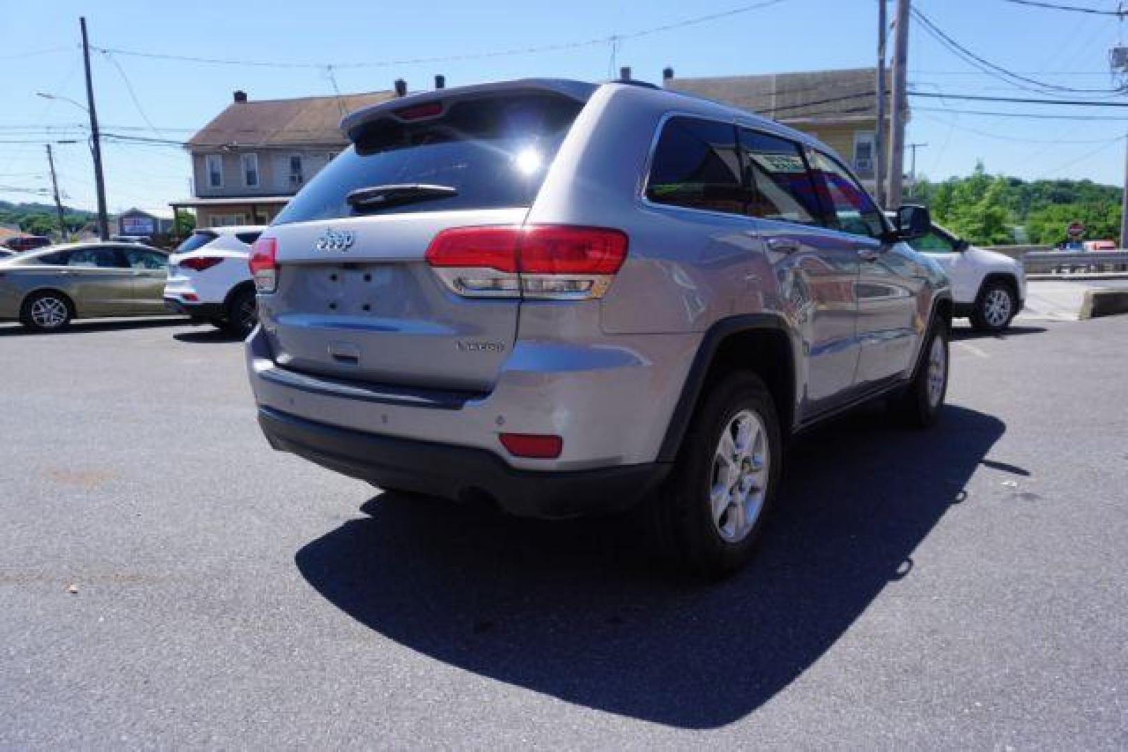 2016 Billet Silver Metallic Clear Coat Jeep Grand Cherokee SPORT UTILITY 4-DR (1C4RJFAG5GC) with an 3.6L V6 DOHC 24V engine, 8-Speed Automatic transmission, located at 312 Centre Ave, Schuylkill Haven, PA, 17972, (570) 593-5278, 40.638130, -76.177383 - navigation system, power liftgate, rear parking sensors, universal garage door opener - Photo#11