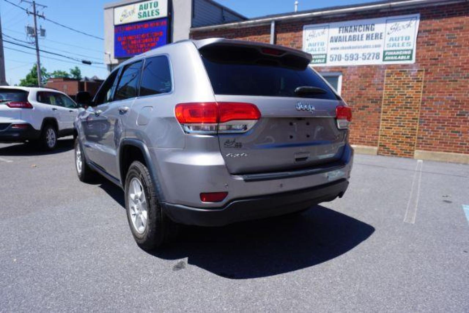 2016 Billet Silver Metallic Clear Coat Jeep Grand Cherokee SPORT UTILITY 4-DR (1C4RJFAG5GC) with an 3.6L V6 DOHC 24V engine, 8-Speed Automatic transmission, located at 312 Centre Ave, Schuylkill Haven, PA, 17972, (570) 593-5278, 40.638130, -76.177383 - navigation system, power liftgate, rear parking sensors, universal garage door opener - Photo#13