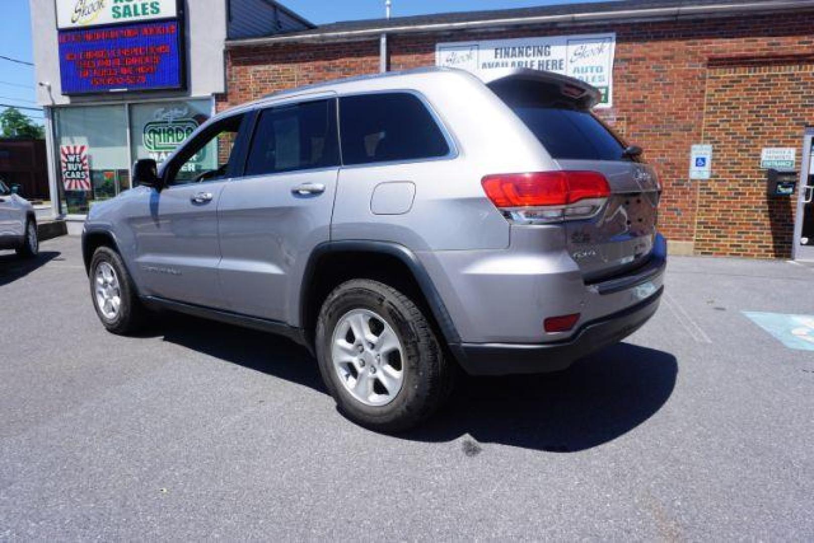 2016 Billet Silver Metallic Clear Coat Jeep Grand Cherokee SPORT UTILITY 4-DR (1C4RJFAG5GC) with an 3.6L V6 DOHC 24V engine, 8-Speed Automatic transmission, located at 312 Centre Ave, Schuylkill Haven, PA, 17972, (570) 593-5278, 40.638130, -76.177383 - navigation system, power liftgate, rear parking sensors, universal garage door opener - Photo#14