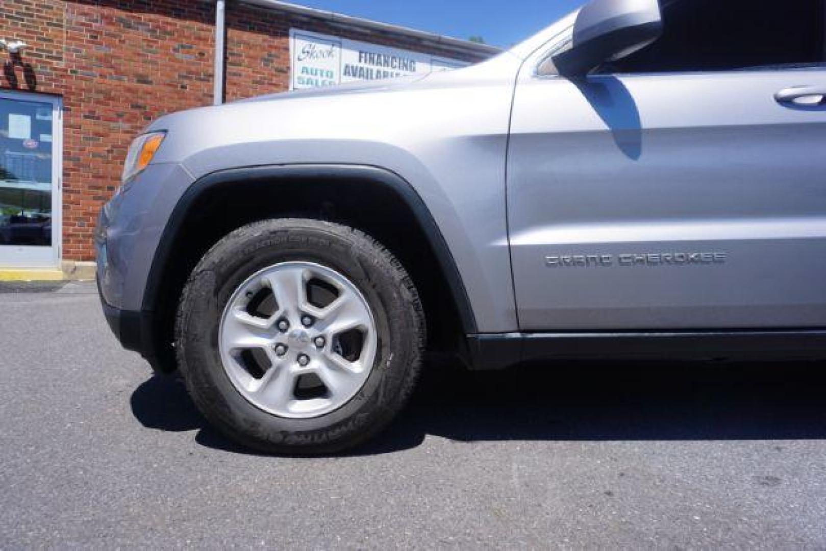 2016 Billet Silver Metallic Clear Coat Jeep Grand Cherokee SPORT UTILITY 4-DR (1C4RJFAG5GC) with an 3.6L V6 DOHC 24V engine, 8-Speed Automatic transmission, located at 312 Centre Ave, Schuylkill Haven, PA, 17972, (570) 593-5278, 40.638130, -76.177383 - navigation system, power liftgate, rear parking sensors, universal garage door opener - Photo#1