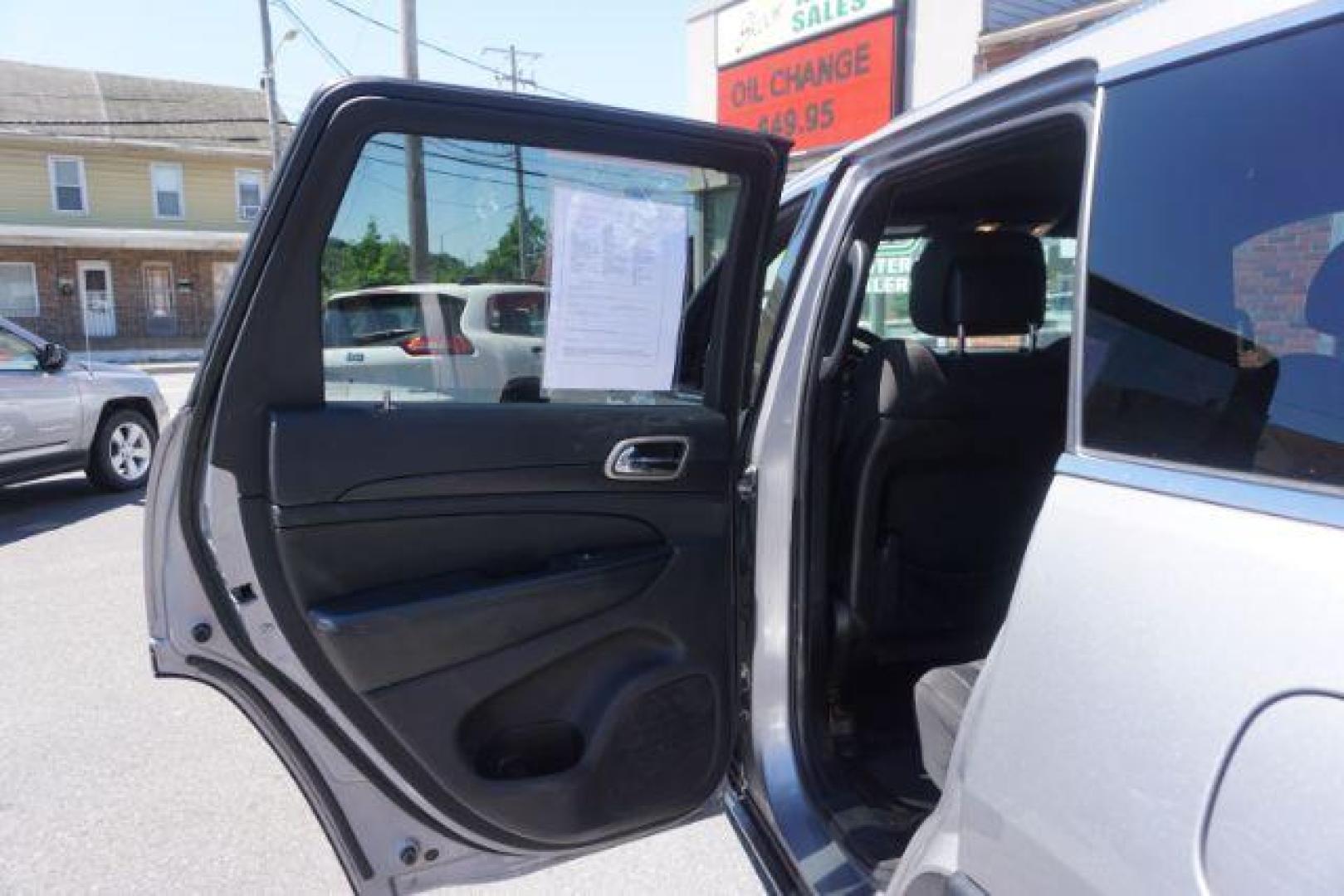 2016 Billet Silver Metallic Clear Coat Jeep Grand Cherokee SPORT UTILITY 4-DR (1C4RJFAG5GC) with an 3.6L V6 DOHC 24V engine, 8-Speed Automatic transmission, located at 312 Centre Ave, Schuylkill Haven, PA, 17972, (570) 593-5278, 40.638130, -76.177383 - navigation system, power liftgate, rear parking sensors, universal garage door opener - Photo#28