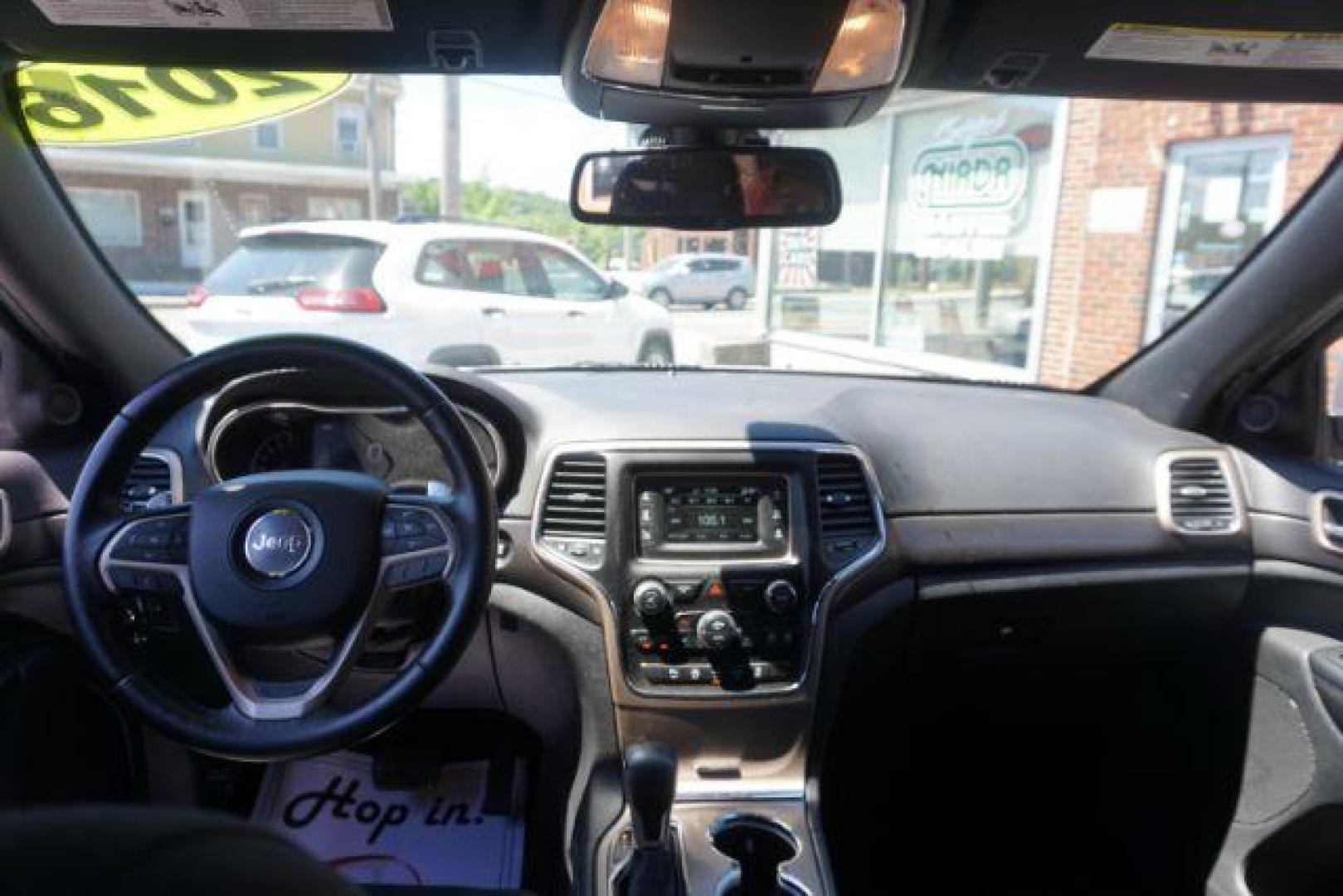 2016 Billet Silver Metallic Clear Coat Jeep Grand Cherokee SPORT UTILITY 4-DR (1C4RJFAG5GC) with an 3.6L V6 DOHC 24V engine, 8-Speed Automatic transmission, located at 312 Centre Ave, Schuylkill Haven, PA, 17972, (570) 593-5278, 40.638130, -76.177383 - navigation system, power liftgate, rear parking sensors, universal garage door opener - Photo#36