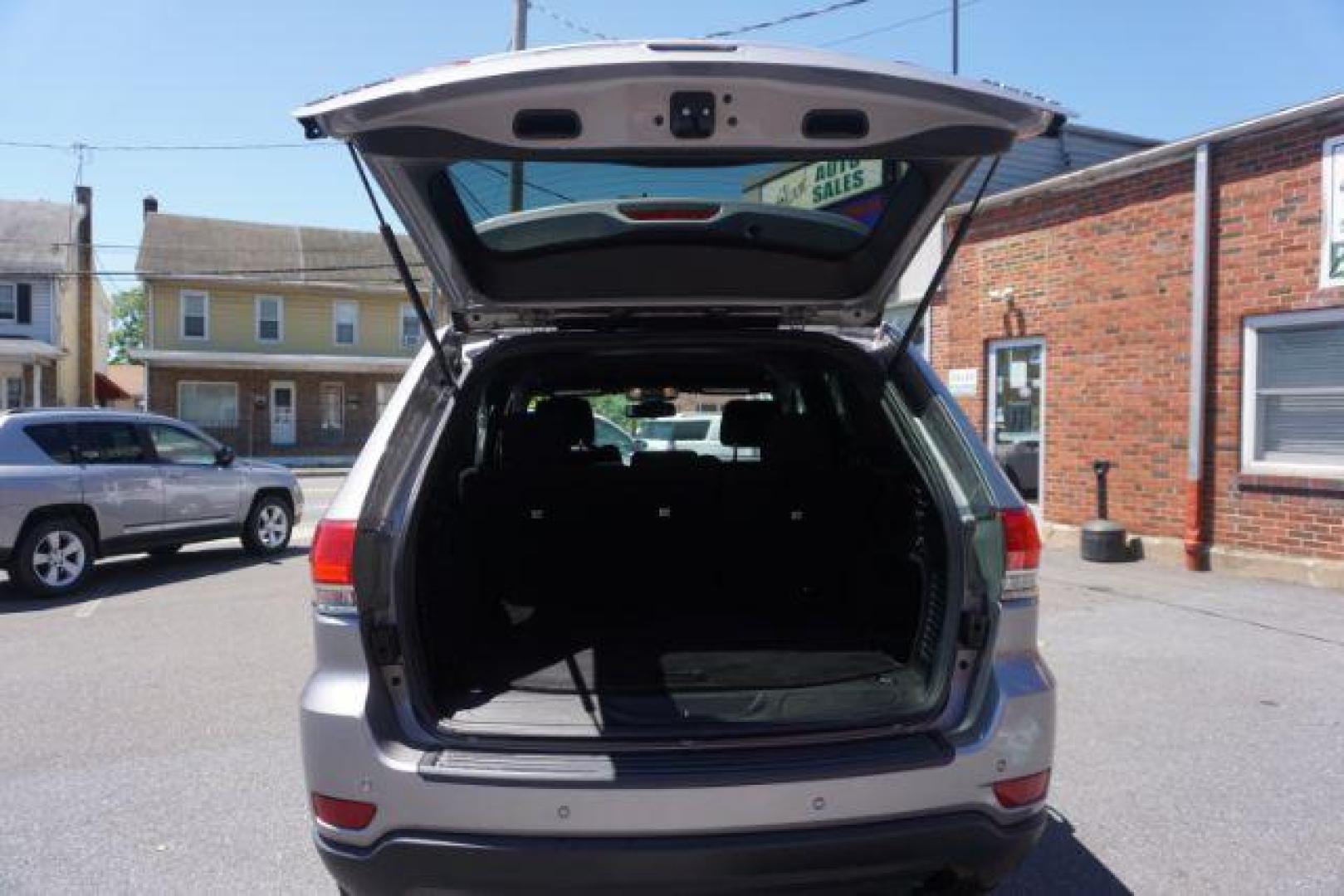 2016 Billet Silver Metallic Clear Coat Jeep Grand Cherokee SPORT UTILITY 4-DR (1C4RJFAG5GC) with an 3.6L V6 DOHC 24V engine, 8-Speed Automatic transmission, located at 312 Centre Ave, Schuylkill Haven, PA, 17972, (570) 593-5278, 40.638130, -76.177383 - navigation system, power liftgate, rear parking sensors, universal garage door opener - Photo#38