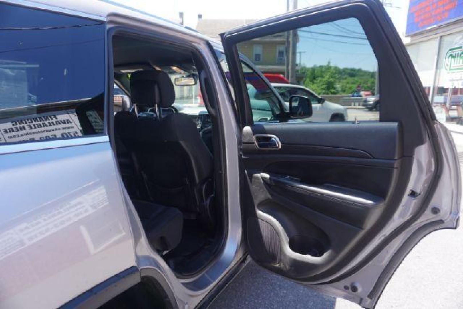 2016 Billet Silver Metallic Clear Coat Jeep Grand Cherokee SPORT UTILITY 4-DR (1C4RJFAG5GC) with an 3.6L V6 DOHC 24V engine, 8-Speed Automatic transmission, located at 312 Centre Ave, Schuylkill Haven, PA, 17972, (570) 593-5278, 40.638130, -76.177383 - navigation system, power liftgate, rear parking sensors, universal garage door opener - Photo#39