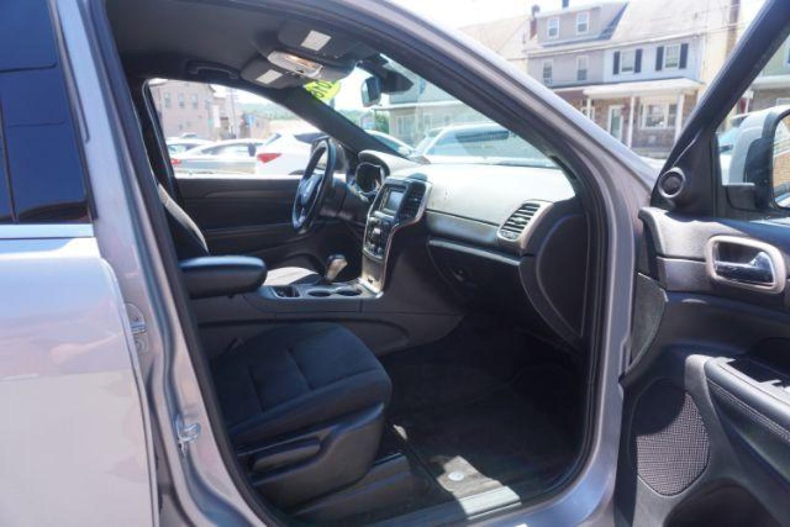 2016 Billet Silver Metallic Clear Coat Jeep Grand Cherokee SPORT UTILITY 4-DR (1C4RJFAG5GC) with an 3.6L V6 DOHC 24V engine, 8-Speed Automatic transmission, located at 312 Centre Ave, Schuylkill Haven, PA, 17972, (570) 593-5278, 40.638130, -76.177383 - navigation system, power liftgate, rear parking sensors, universal garage door opener - Photo#49