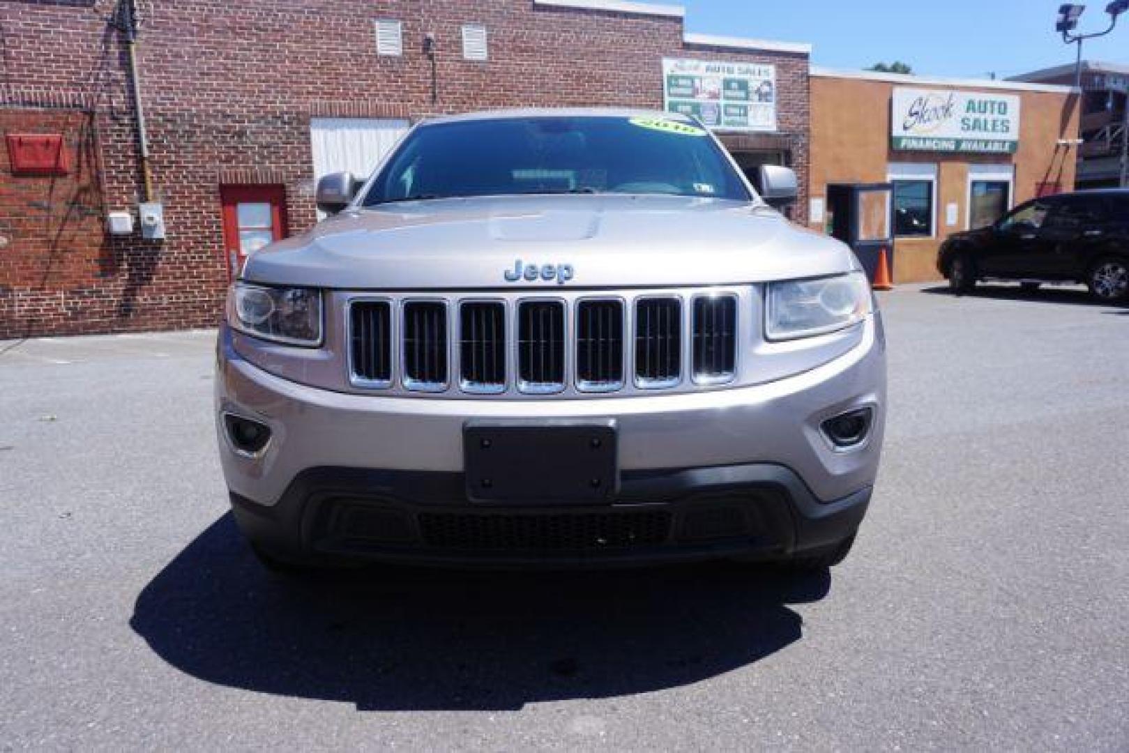 2016 Billet Silver Metallic Clear Coat Jeep Grand Cherokee SPORT UTILITY 4-DR (1C4RJFAG5GC) with an 3.6L V6 DOHC 24V engine, 8-Speed Automatic transmission, located at 312 Centre Ave, Schuylkill Haven, PA, 17972, (570) 593-5278, 40.638130, -76.177383 - navigation system, power liftgate, rear parking sensors, universal garage door opener - Photo#5