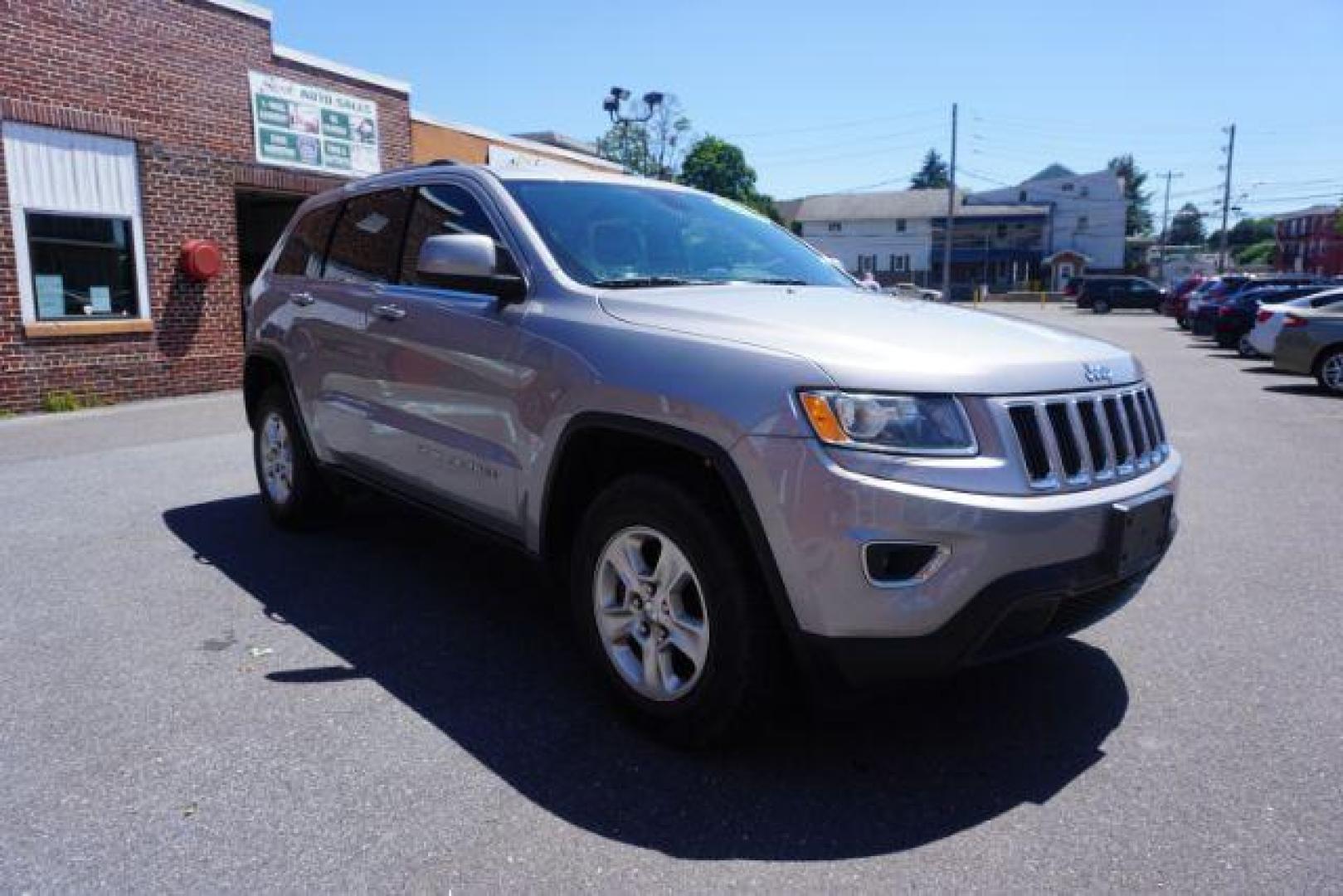 2016 Billet Silver Metallic Clear Coat Jeep Grand Cherokee SPORT UTILITY 4-DR (1C4RJFAG5GC) with an 3.6L V6 DOHC 24V engine, 8-Speed Automatic transmission, located at 312 Centre Ave, Schuylkill Haven, PA, 17972, (570) 593-5278, 40.638130, -76.177383 - navigation system, power liftgate, rear parking sensors, universal garage door opener - Photo#6